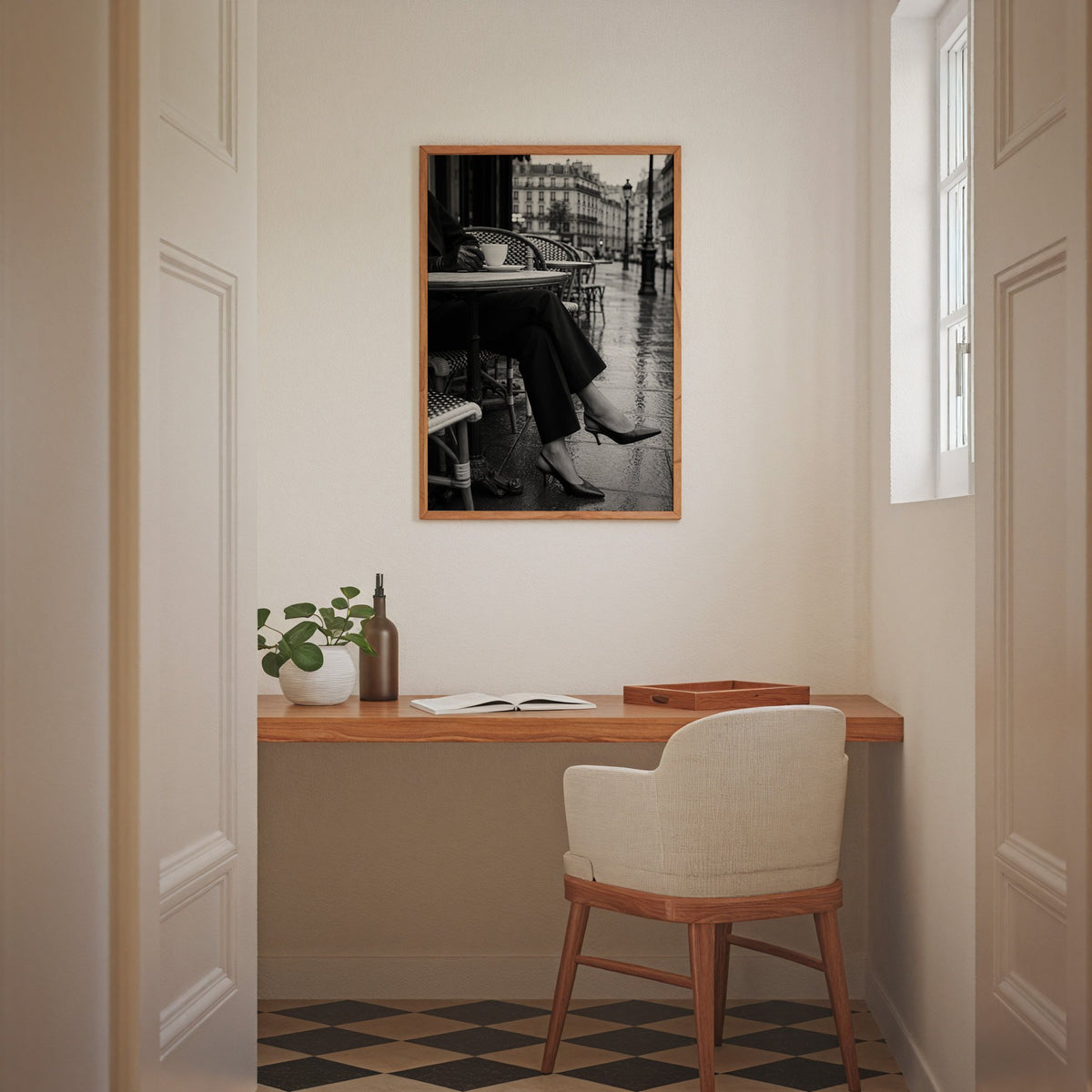 Black heels at rainy Paris café table print in an oak frame above a home office desk nook