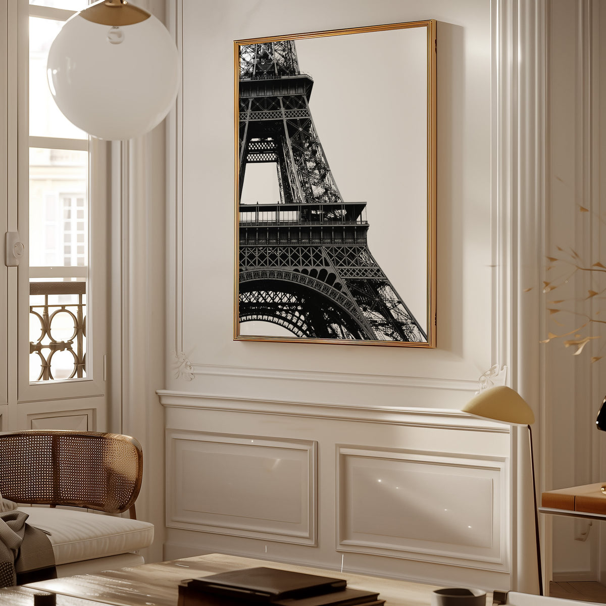 Eiffel Tower close-up on white background print shown in a gold frame in a Parisian paneled living room