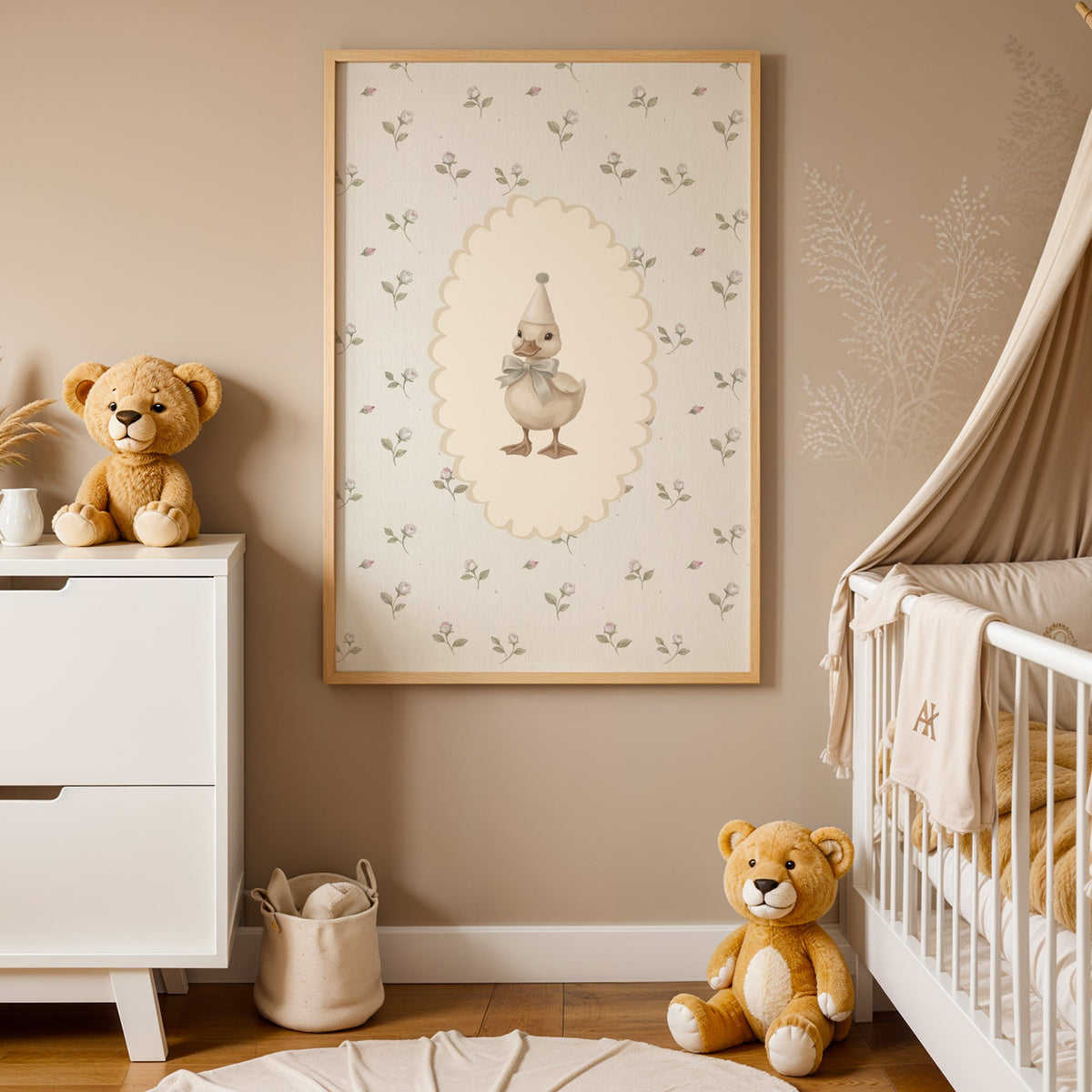 Party duckling in cream oval on rosebuds nursery print in an oak frame between a white dresser and a canopy crib