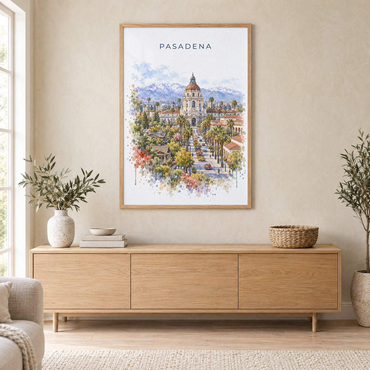 Pasadena watercolor print in an oak frame above a light wood sideboard in a Scandinavian living room