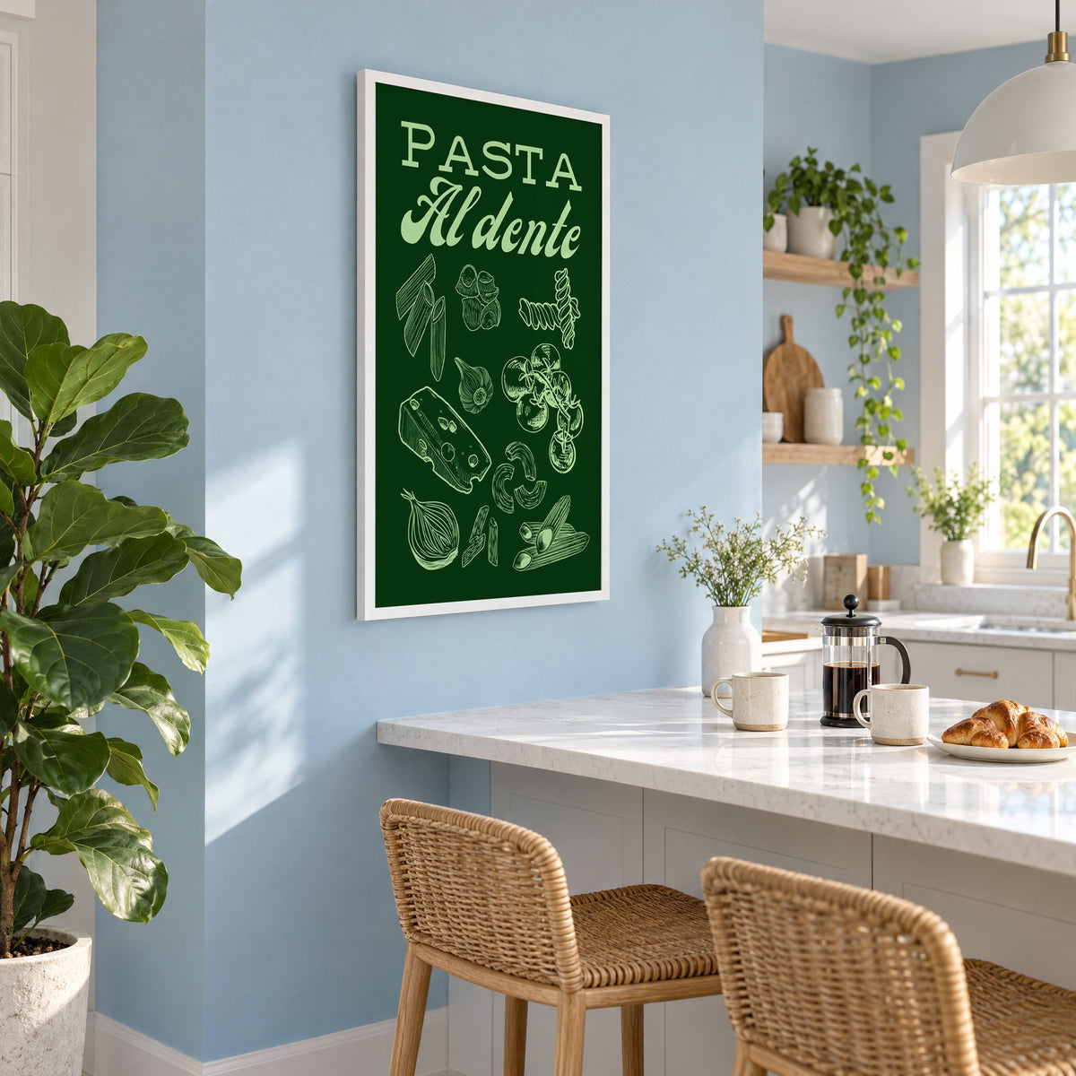 Pasta Al dente engraved green print in a white frame on a pale blue wall above a breakfast bar with rattan stools