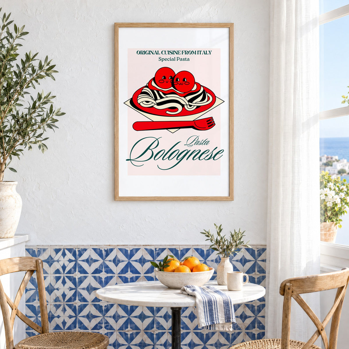 Pasta Bolognese smiling meatballs print in an oak frame above a bistro table and blue patterned tiles