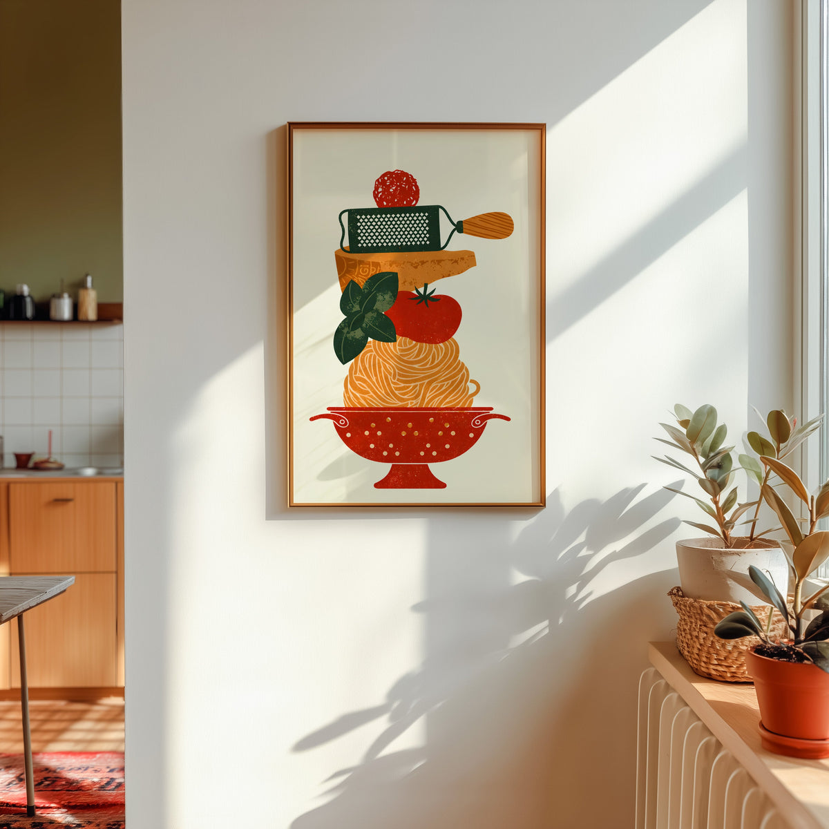 Pasta colander print in a gold frame in sunlight with plants and a kitchen beyond