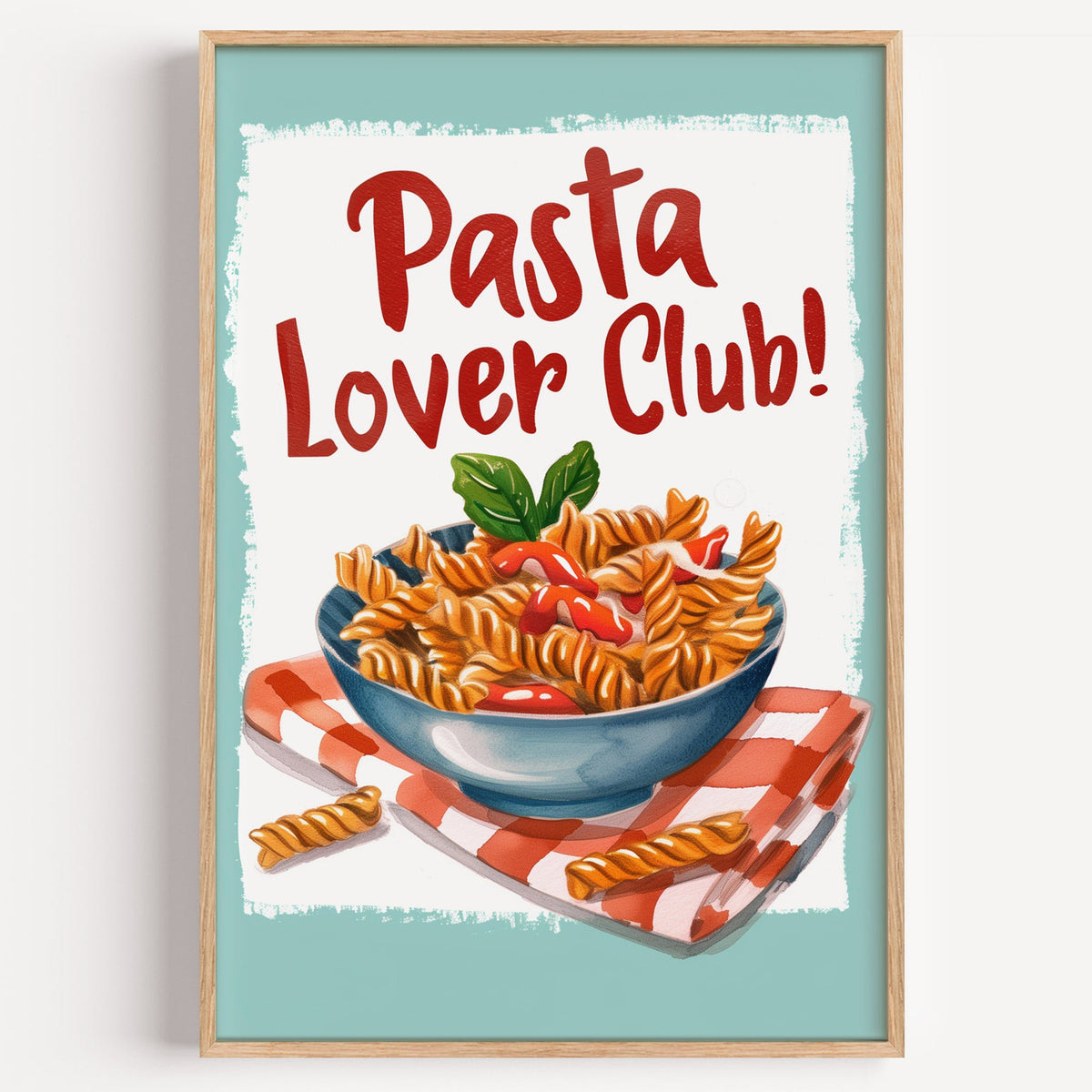 Pasta Lover Club fusilli bowl print in a light oak frame on a plain white wall