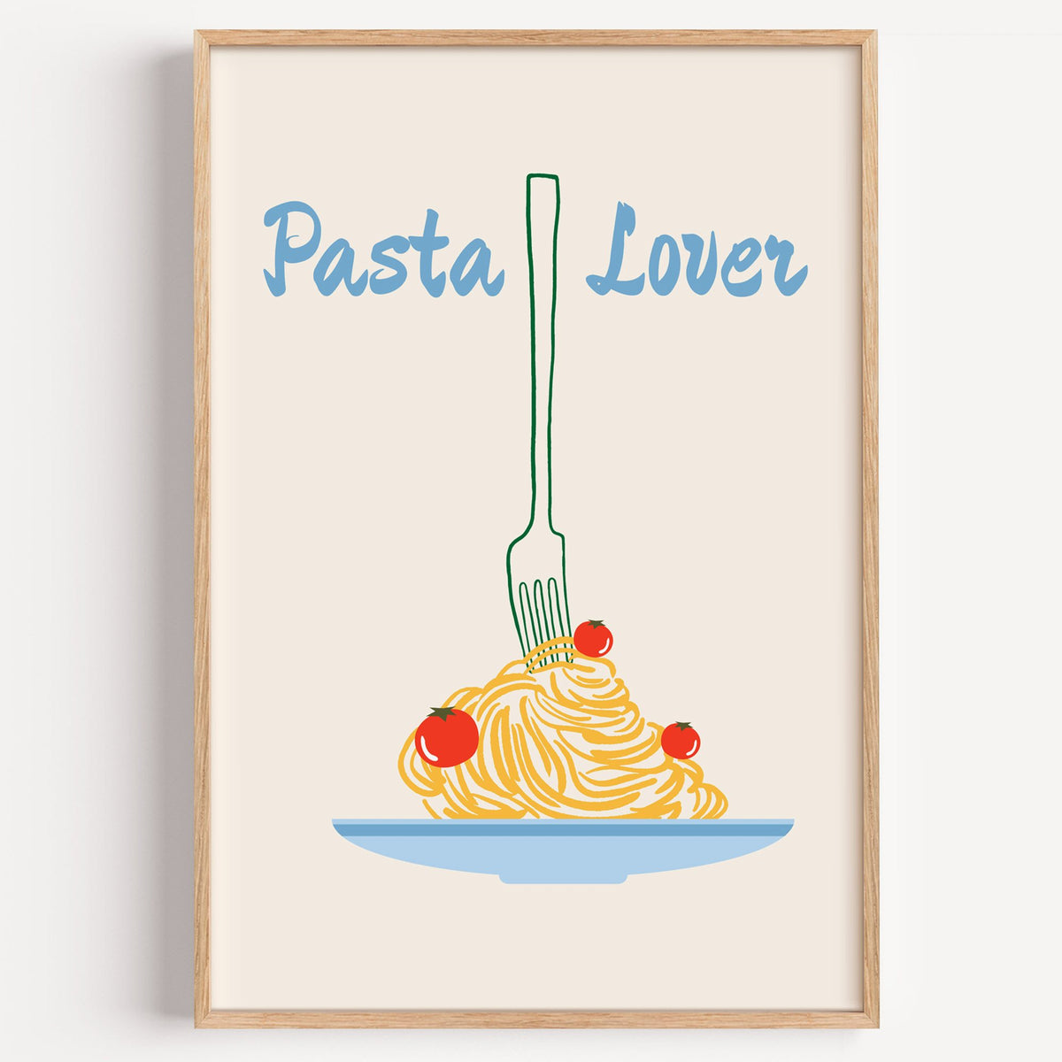 Pasta Lover fork and spaghetti print in a light oak frame on a plain white wall