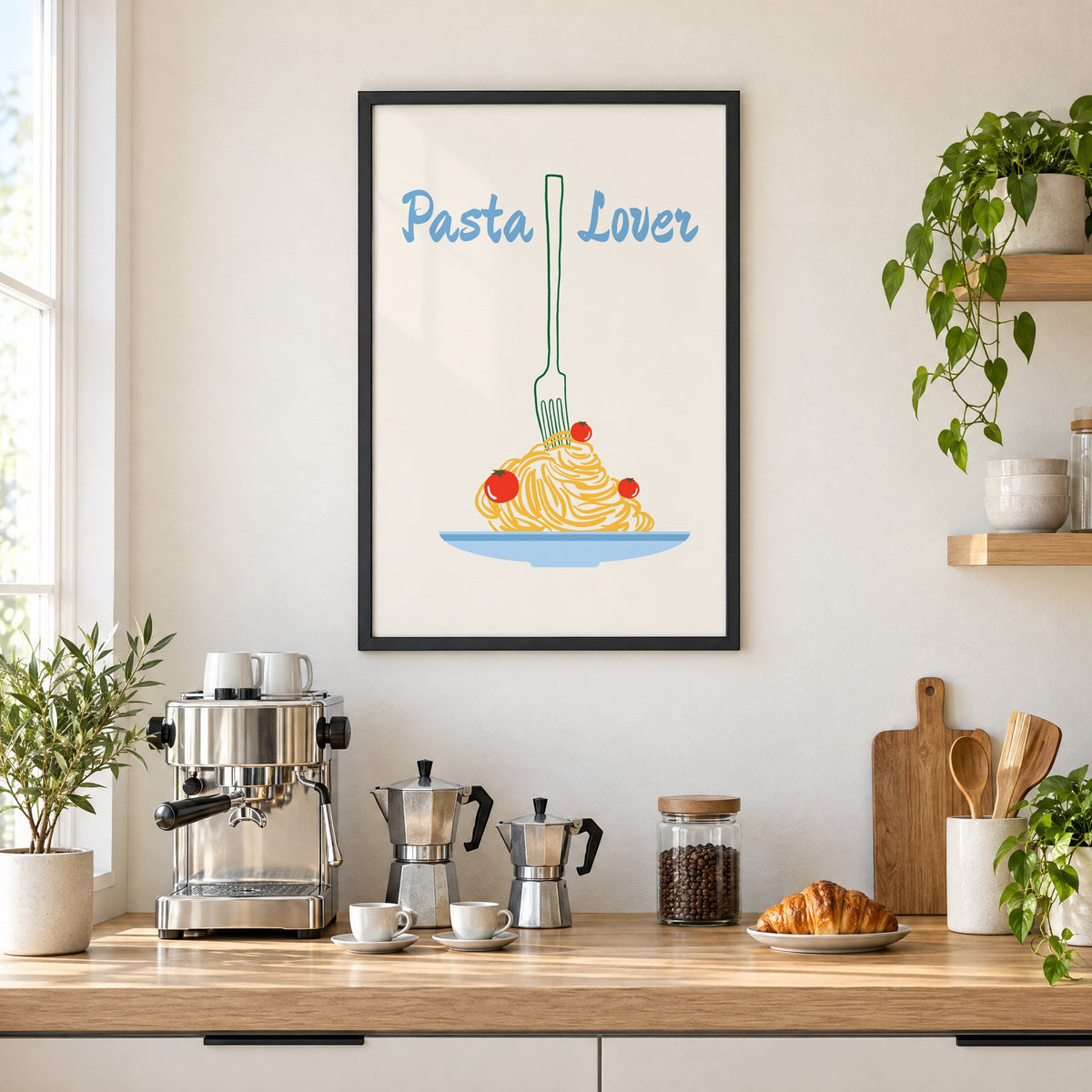 Pasta Lover fork and spaghetti print in a black frame above a home espresso bar with moka pots and espresso cups
