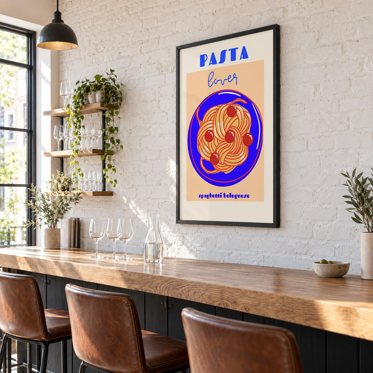 Pasta lover blue plate spaghetti print in a black frame on a white brick wall above a wine bar counter