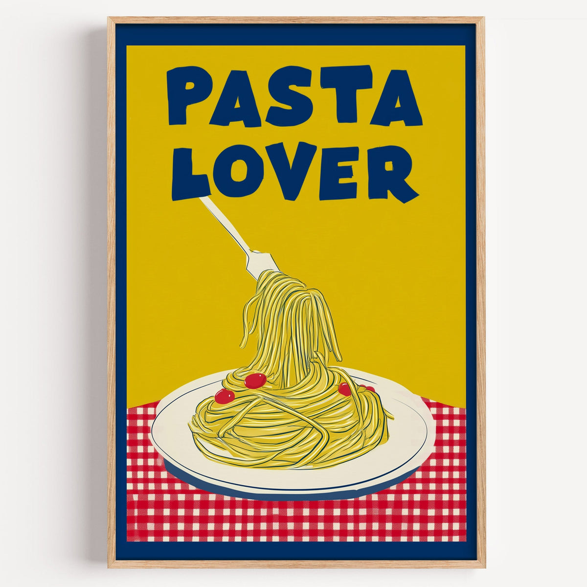 Pasta Lover yellow plate print in a light oak frame on a plain white wall