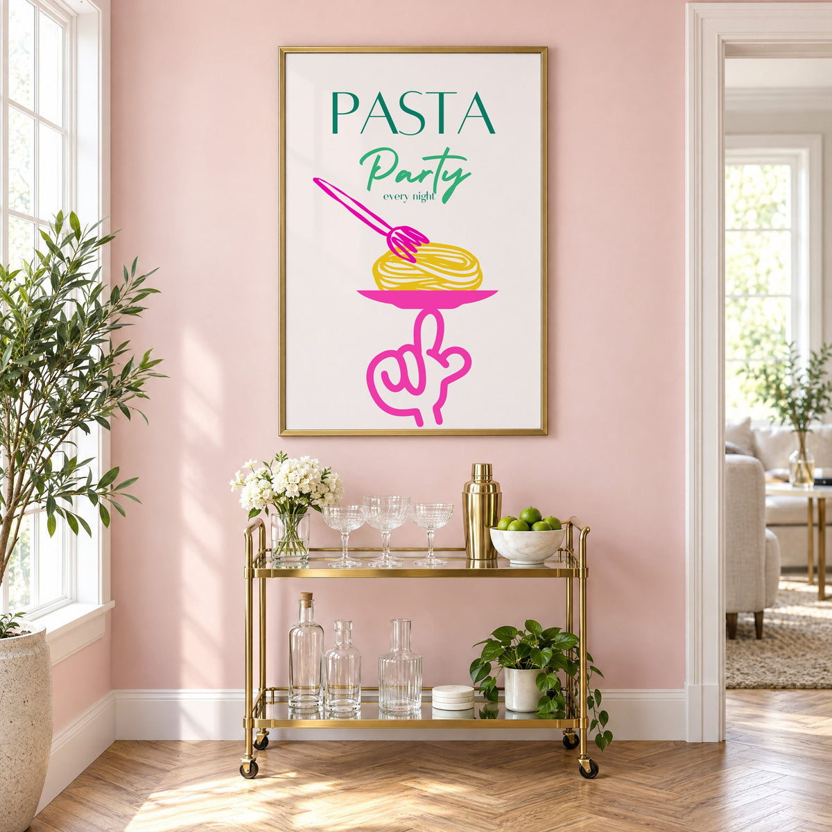 PASTA Party every night spaghetti plate print in a brass frame on a blush pink wall above a gold bar cart with glassware
