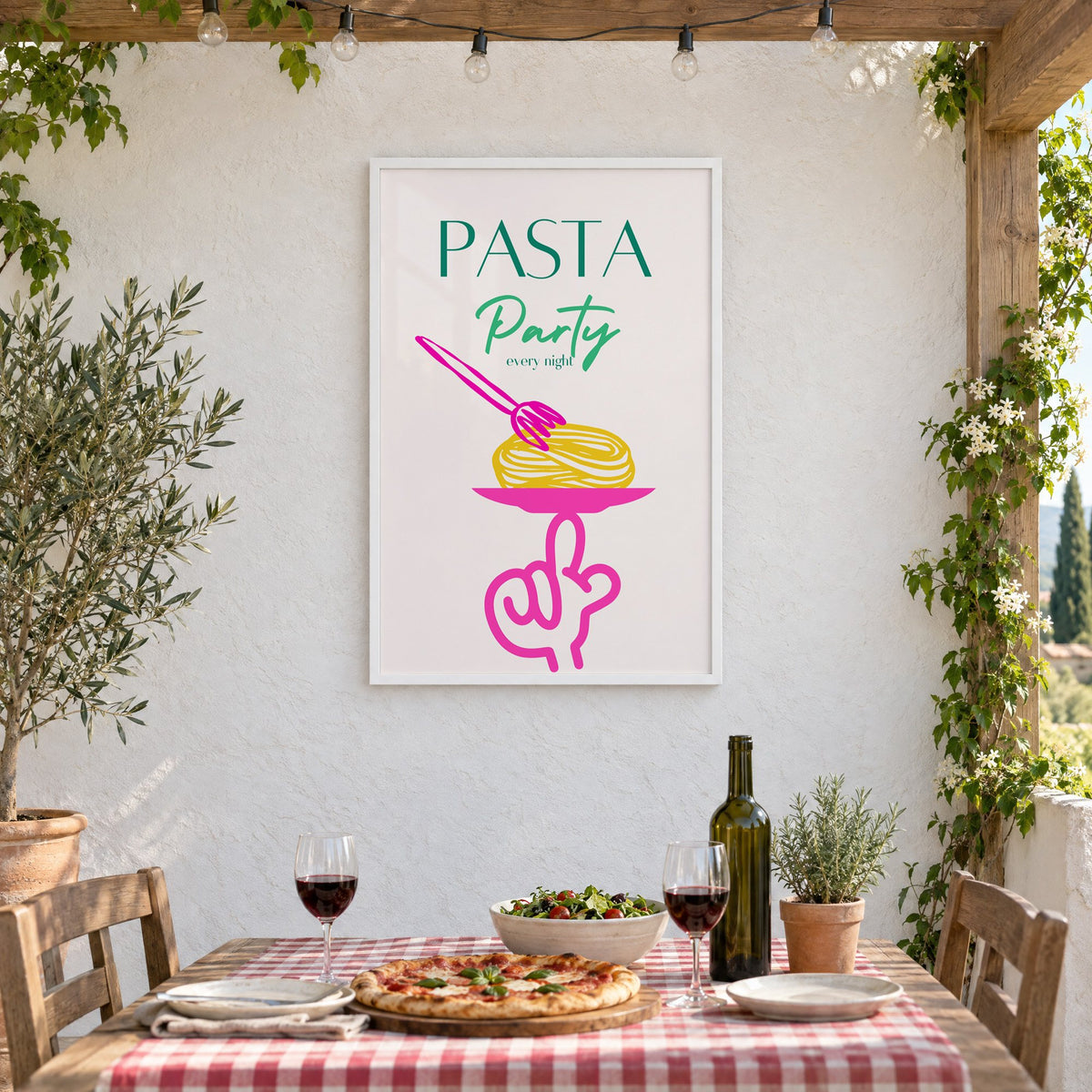 PASTA Party every night spaghetti plate print in a white frame on a stucco wall above a checked-cloth table with pizza and red wine