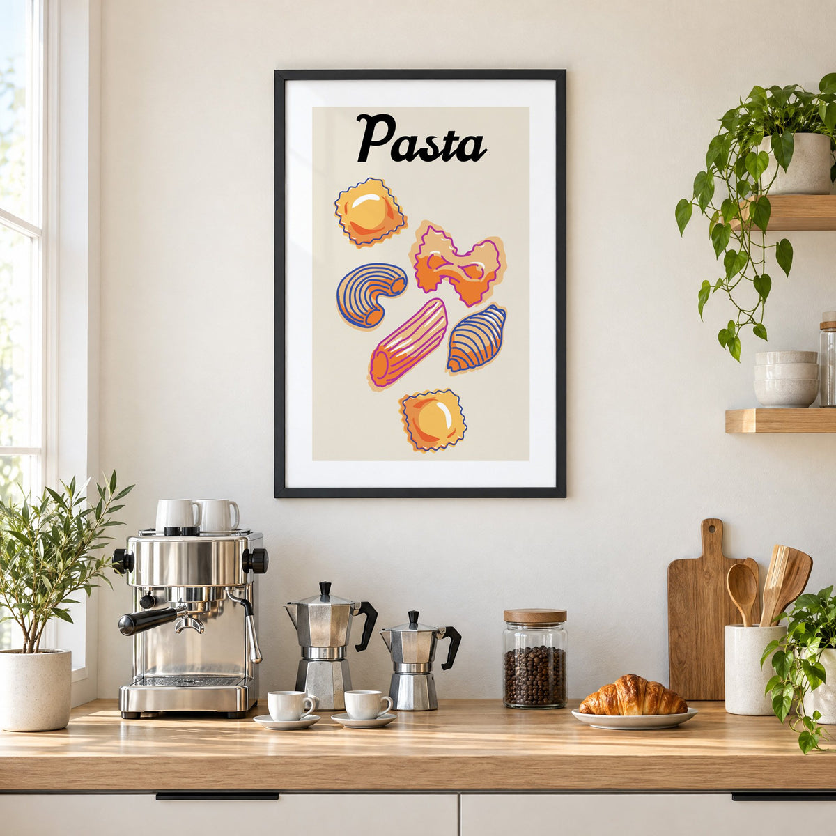Pasta six pasta shapes offset-outline print in a black frame above a home espresso bar with moka pots and espresso cups