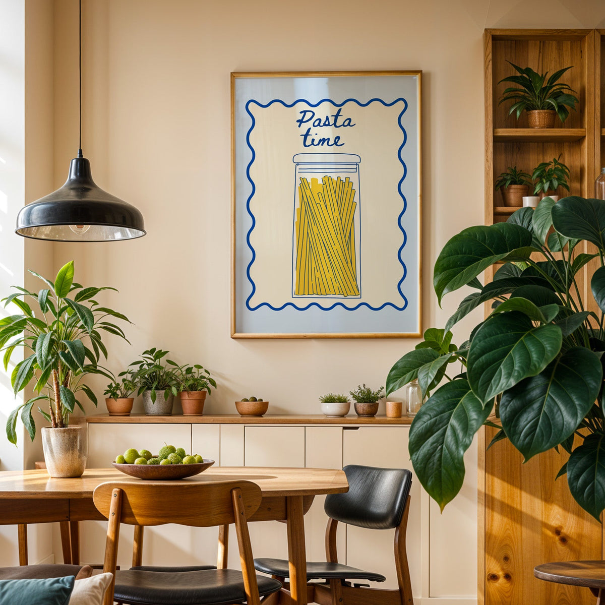 Pasta Time jar print in an oak frame in a dining room above a plant-lined sideboard
