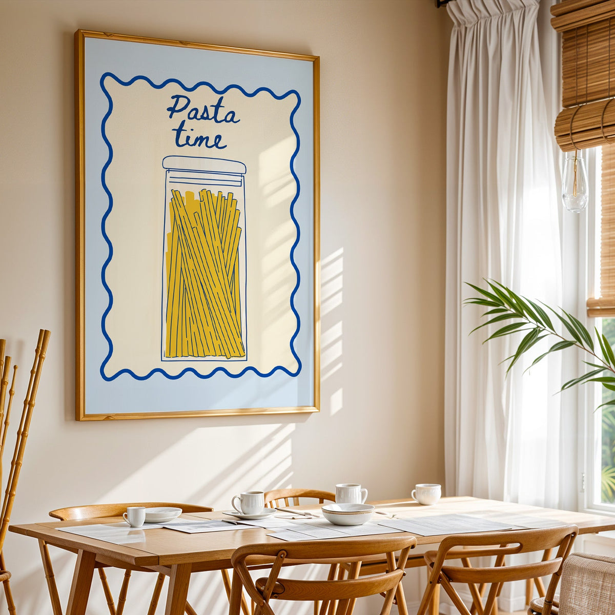 Pasta Time jar print shown in a gold frame above a breakfast table by a curtained window
