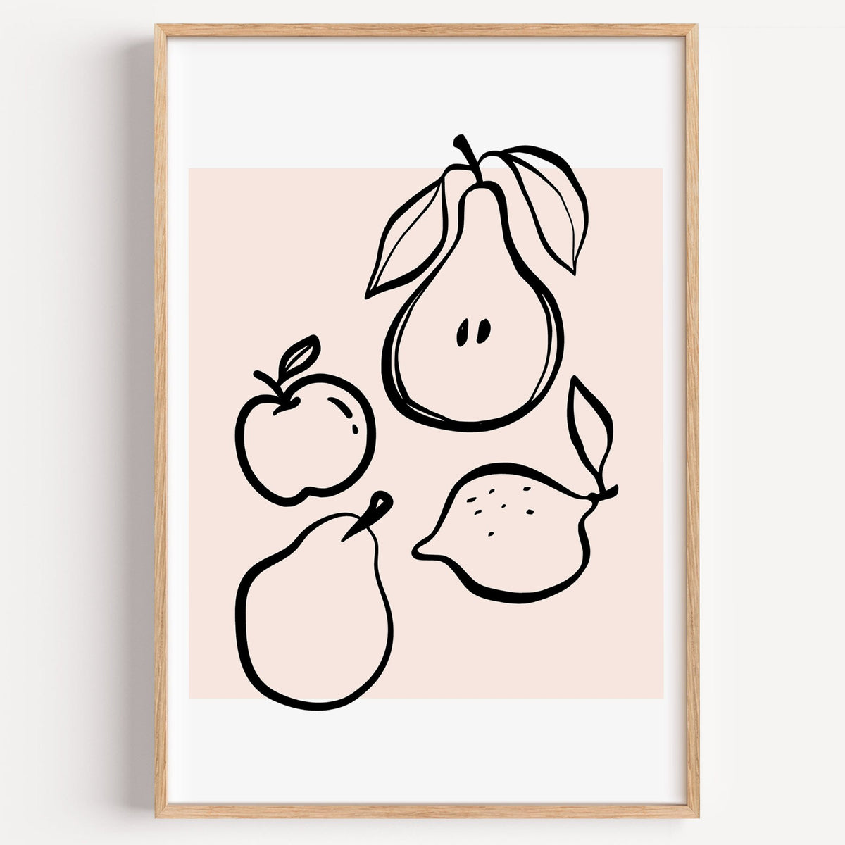 Pear apple lemon black line art print in a light oak frame on a plain white wall