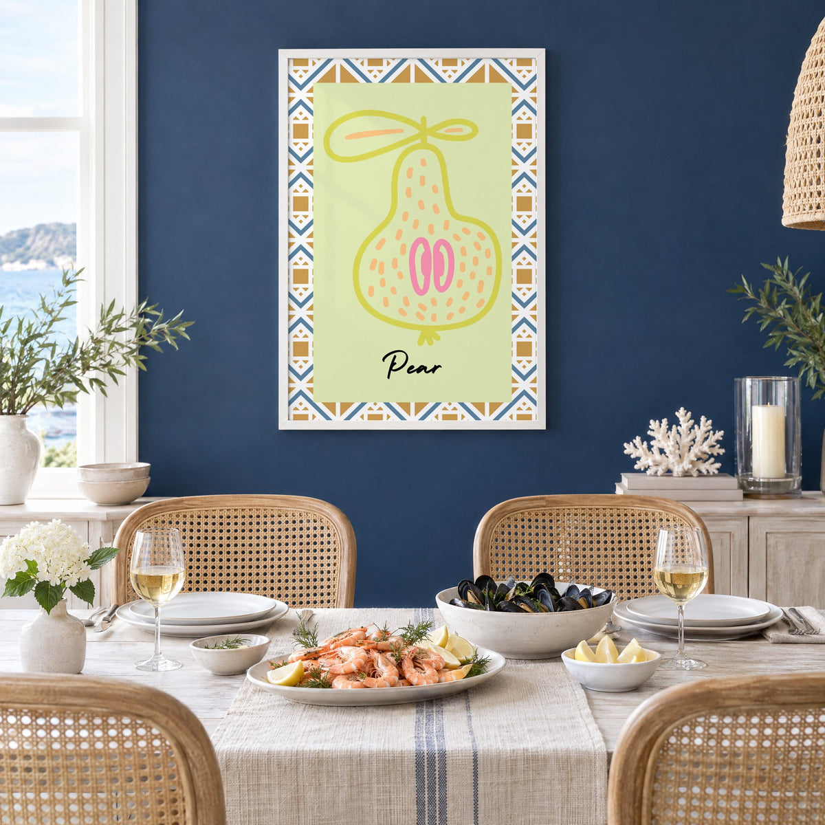 Pear lime line-art zigzag border print in a white frame on a navy wall above a dining table set with shrimp and mussels