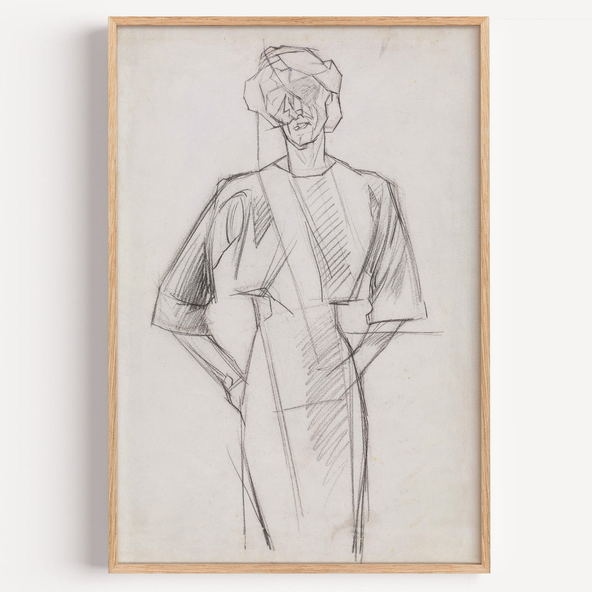 Pencil cubist standing woman sketch print in a light oak frame on a plain white wall