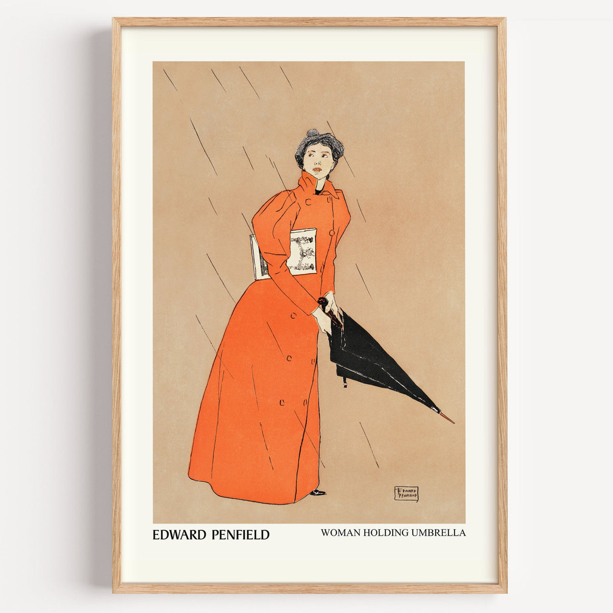 Edward Penfield Woman Holding Umbrella print in a light oak frame on a white wall