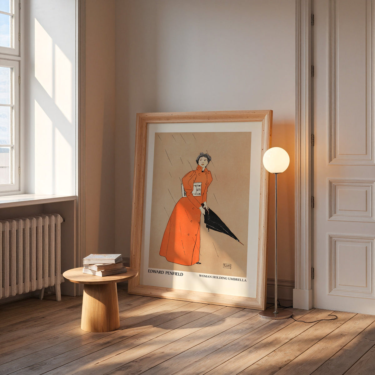Vintage umbrella poster in a wide pine frame leaning by a sunlit window