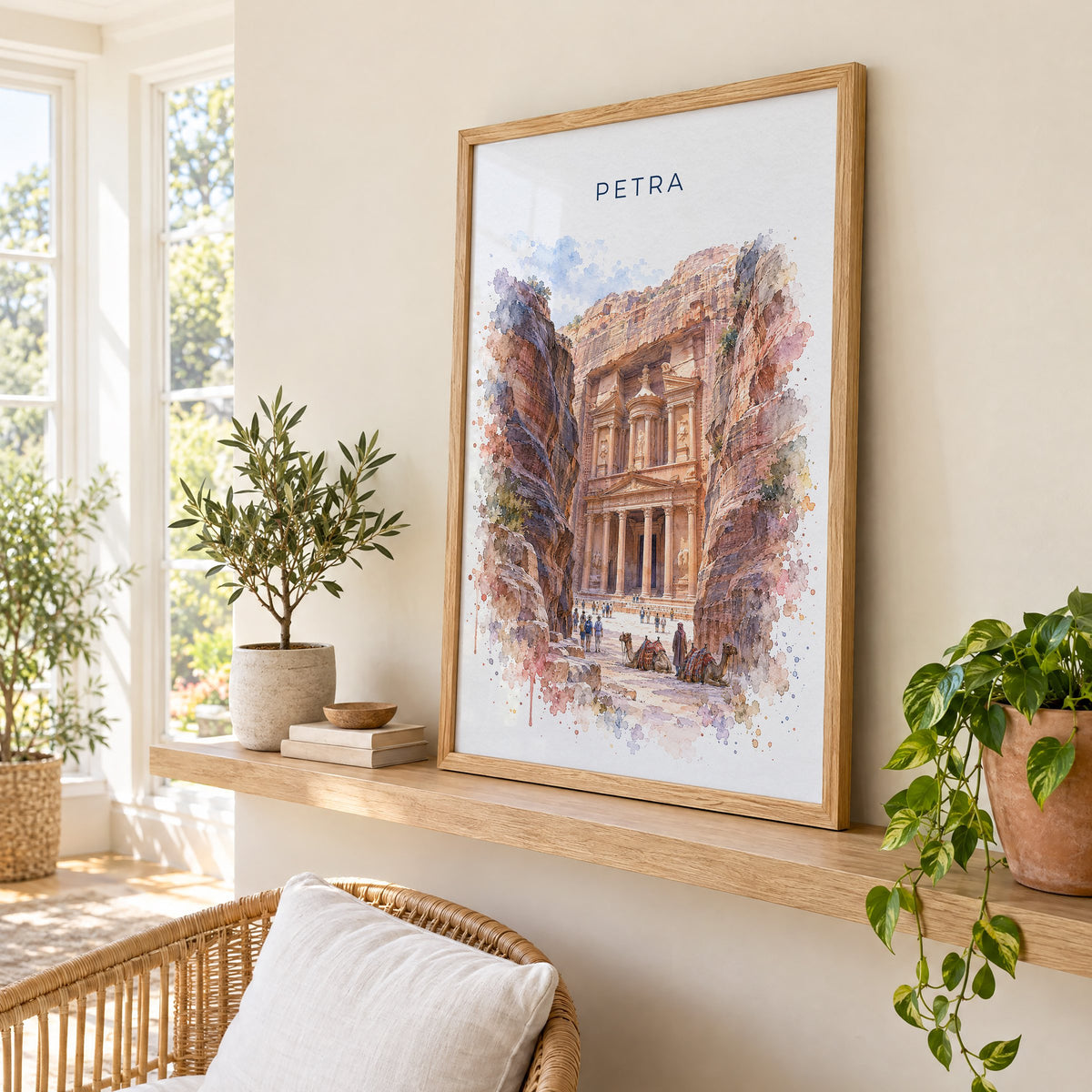 Petra watercolor print in an oak frame on a picture ledge in a sunlit sunroom