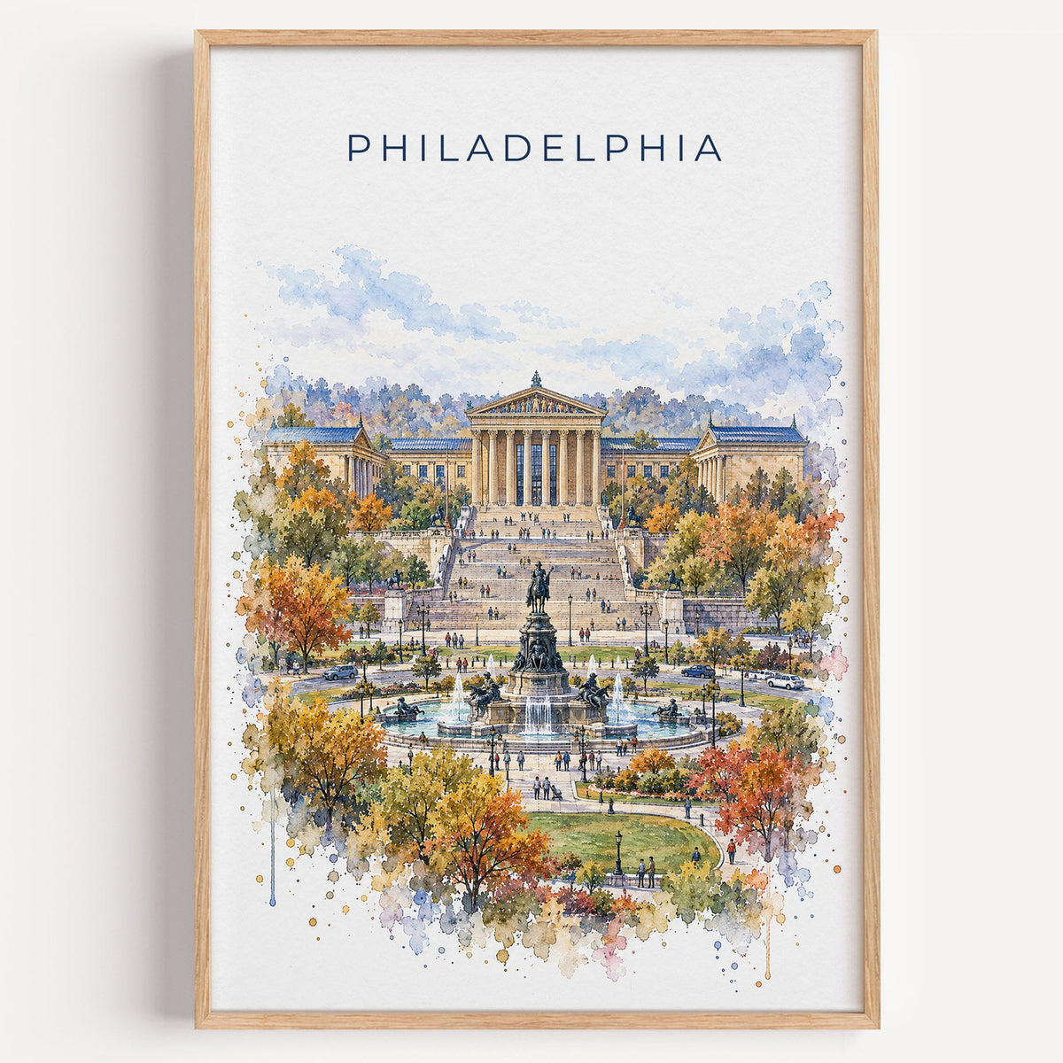 Philadelphia Museum of Art watercolor print in a light oak frame on a plain white wall