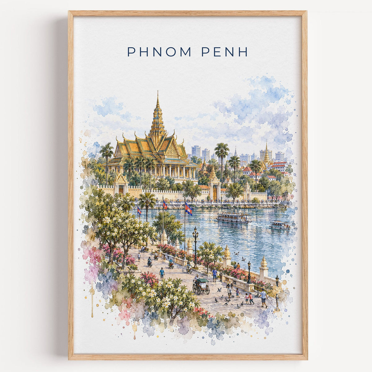 Phnom Penh watercolor print in a light oak frame on a plain white wall