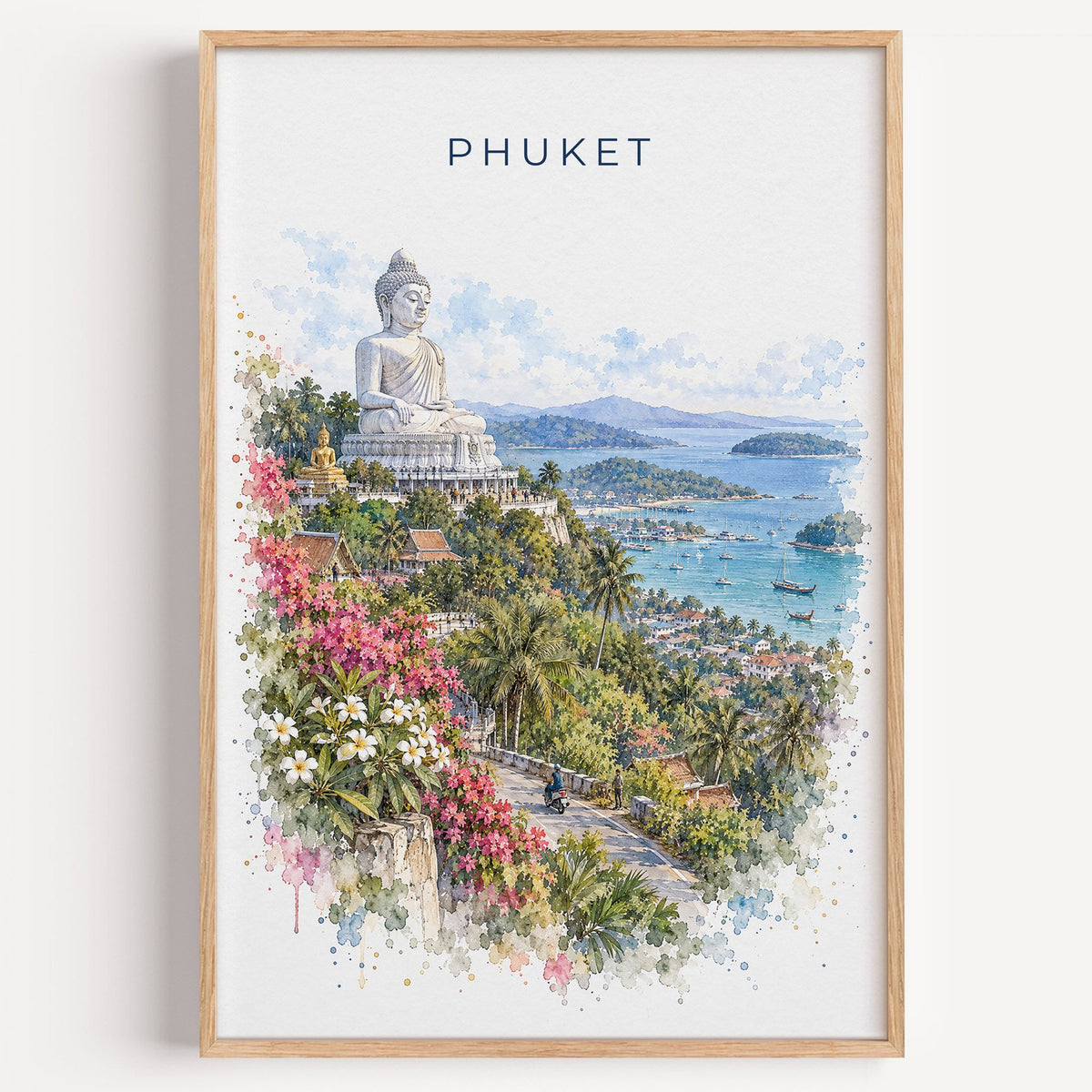 Phuket watercolor print in a light oak frame on a plain white wall