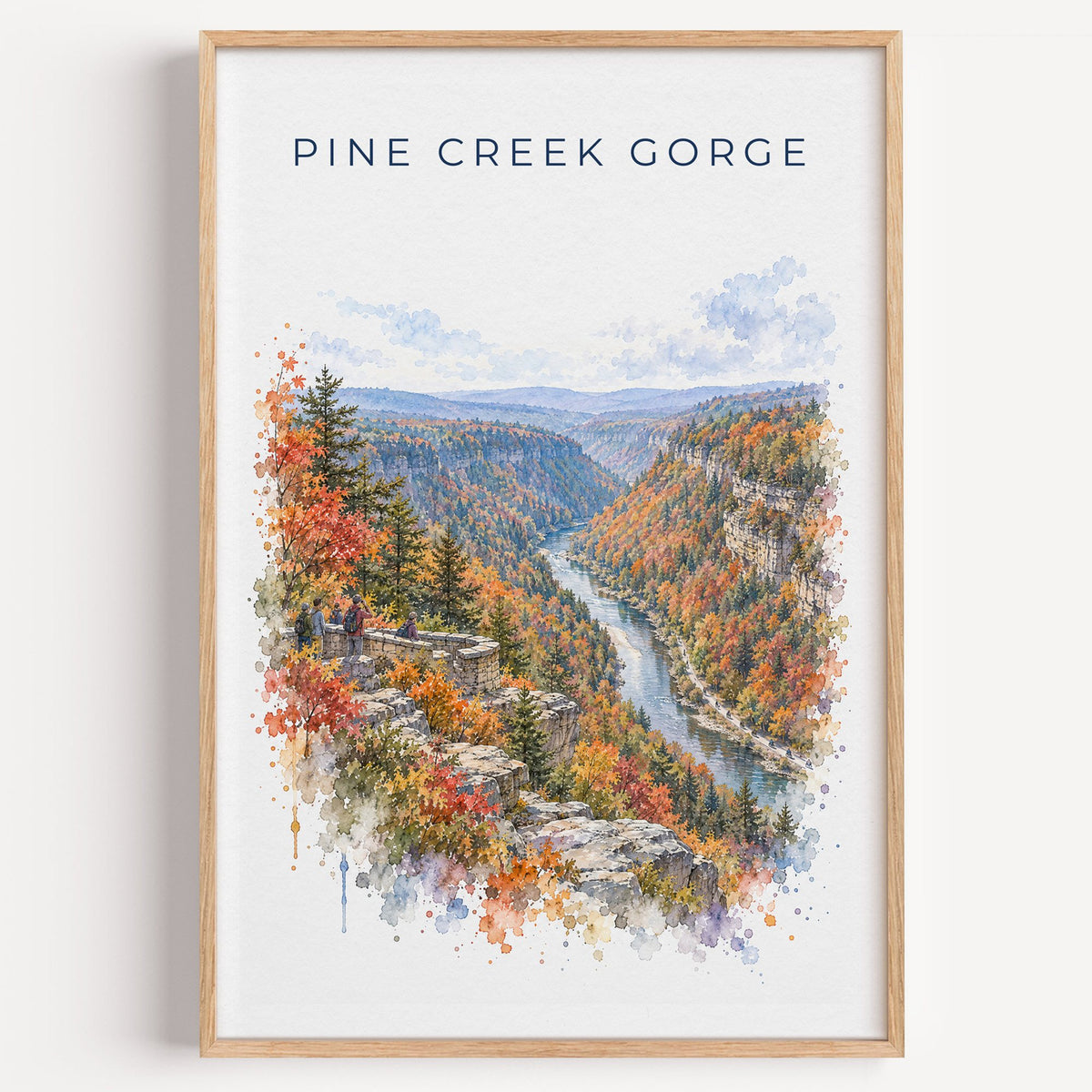 Pine Creek Gorge watercolor print in a light oak frame on a plain white wall