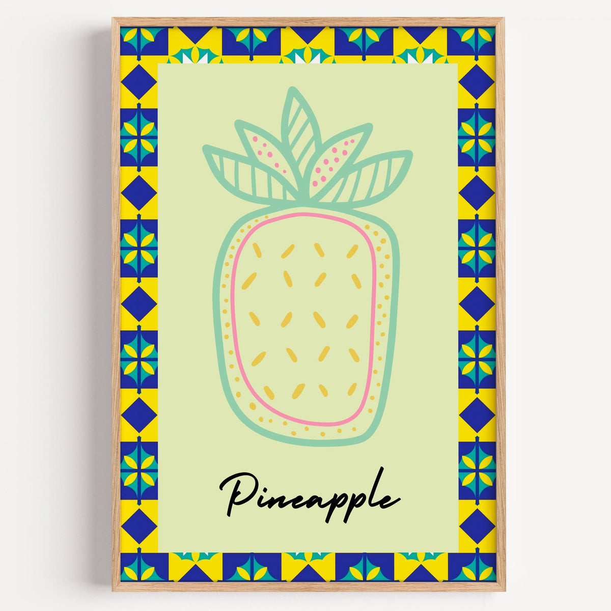 Pineapple mint line-art tile border print in a light oak frame on a plain white wall