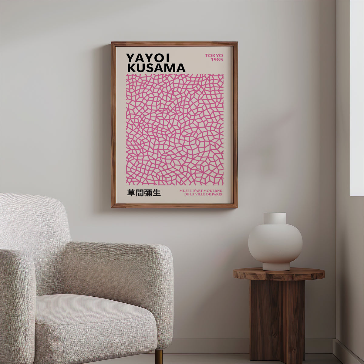 Yayoi Kusama inspired pink net pattern print above a cream boucle armchair