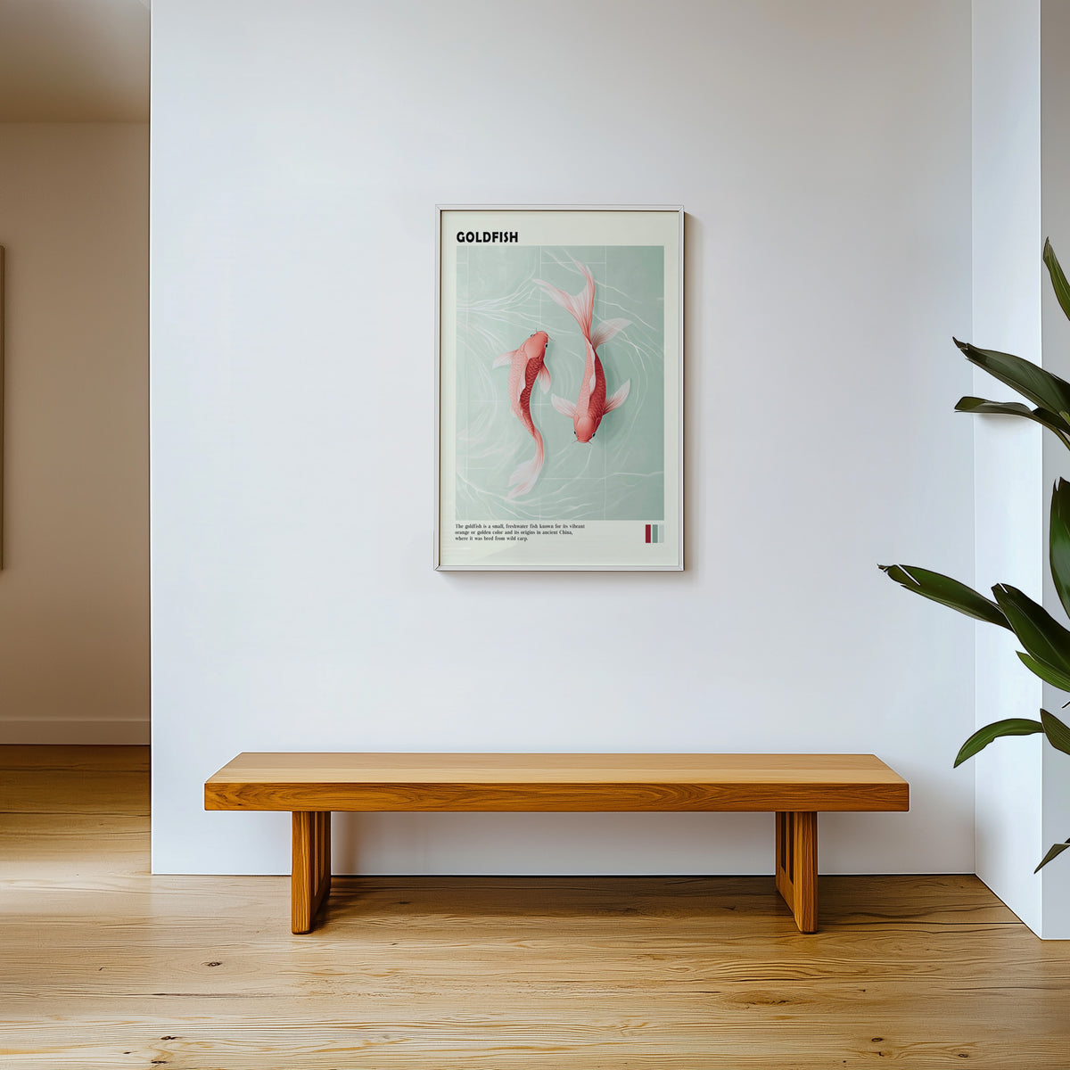 Pink goldfish pair on mint water print shown in a white frame above a wooden entryway bench
