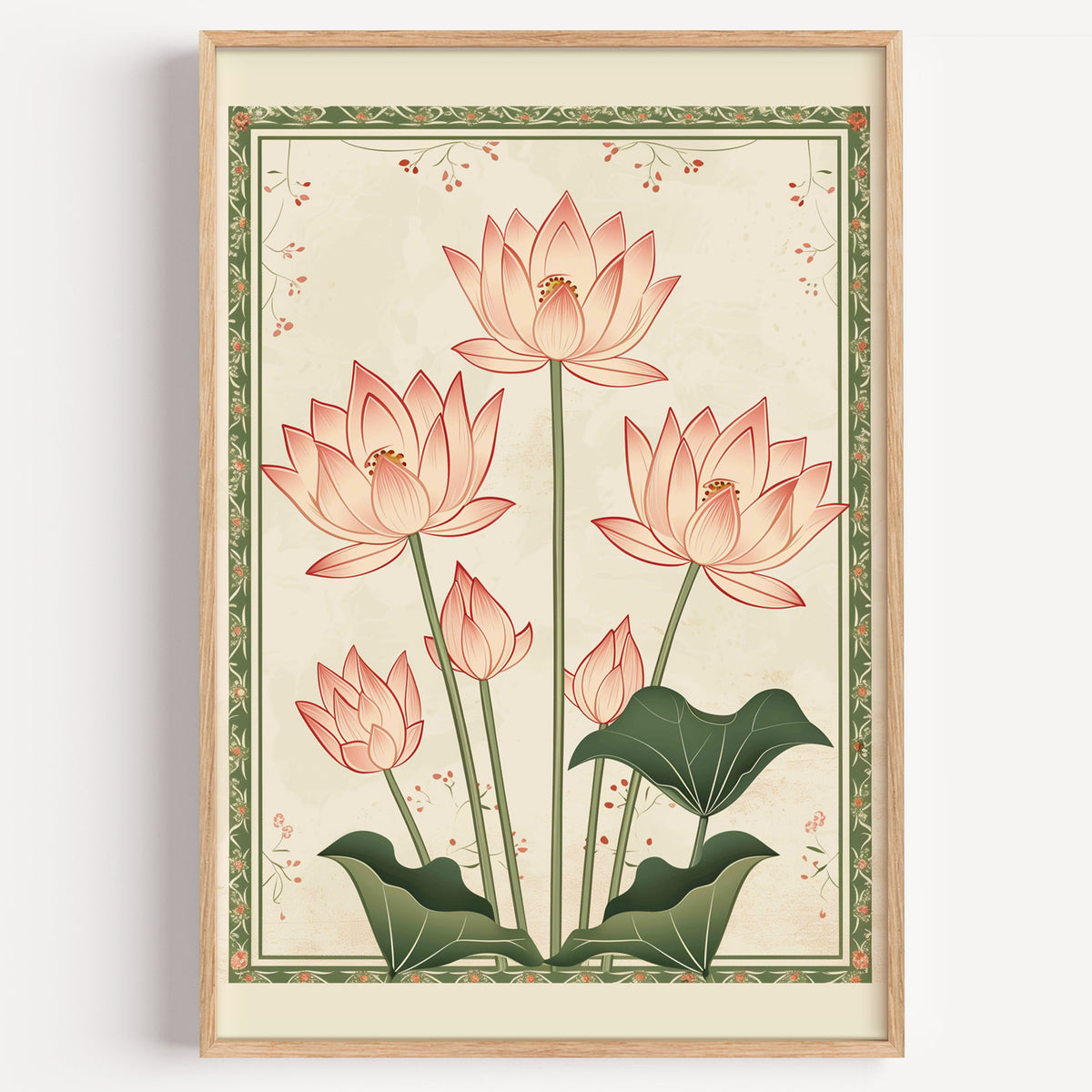 Five pink lotus flowers print in a light oak frame on a plain white wall