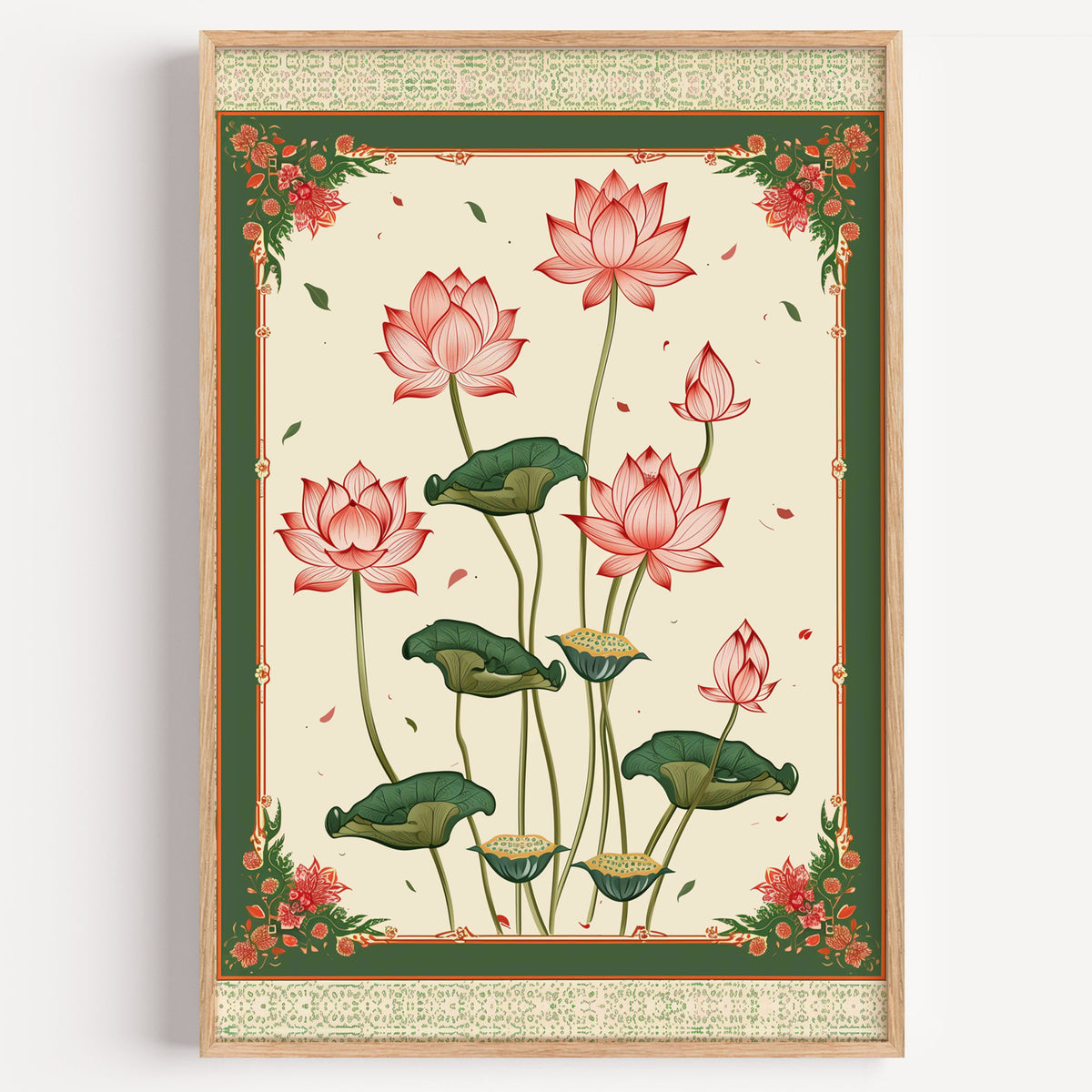 Pink lotus with green ornamental border print in a light oak frame on a plain white wall