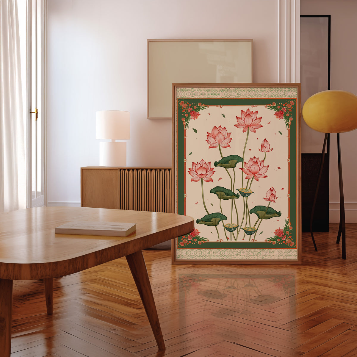 Pink lotus with green ornamental border print in a walnut frame leaning in a mid-century living room