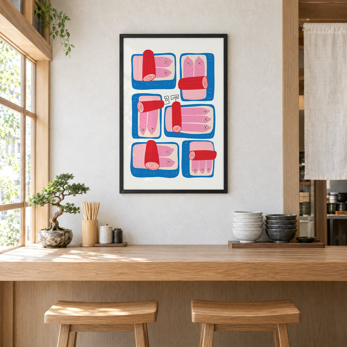 Six blue sardine tins pink fish print in a black frame above a light wood ramen counter with stools and stacked bowls