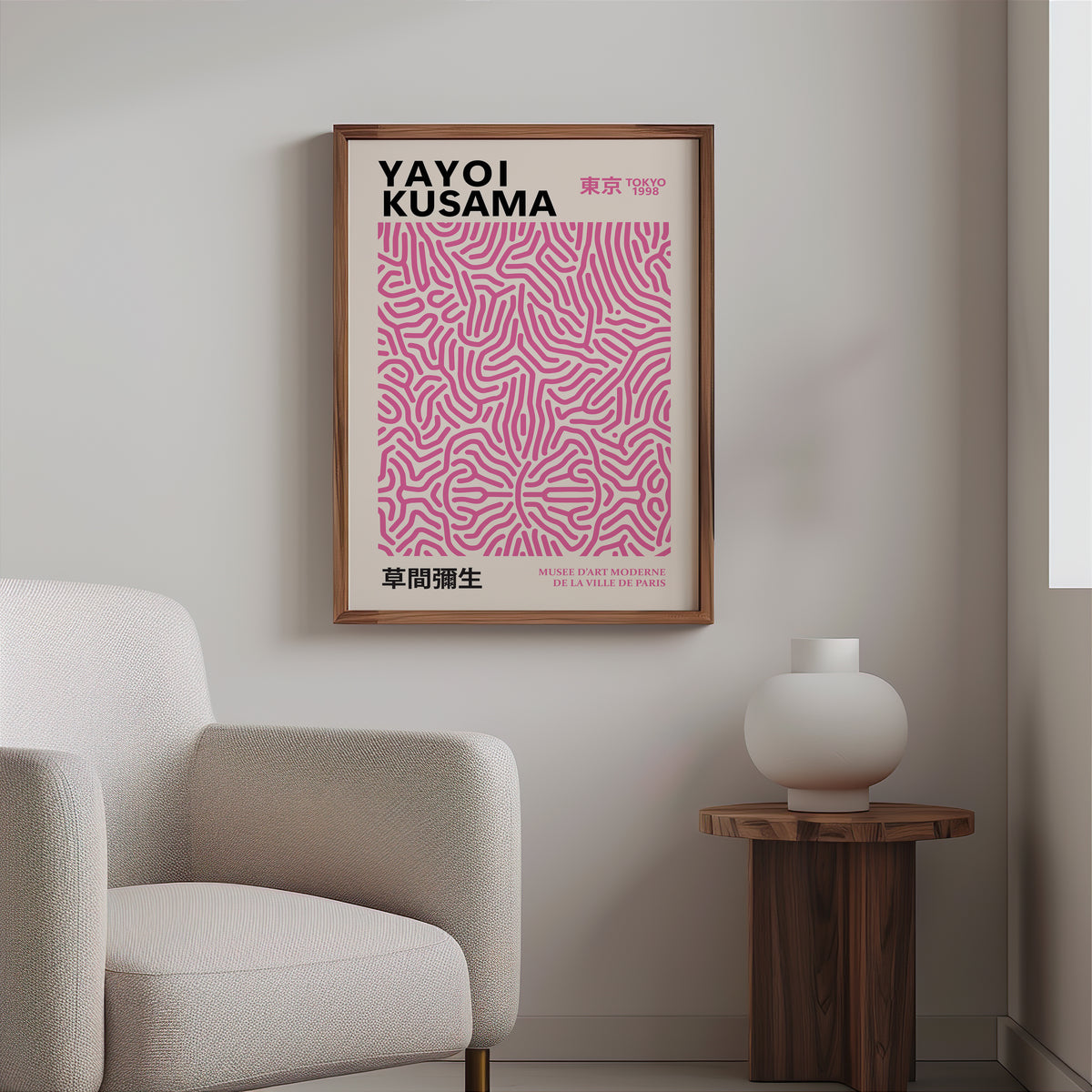 Yayoi Kusama inspired pink squiggle pattern print above a cream boucle armchair