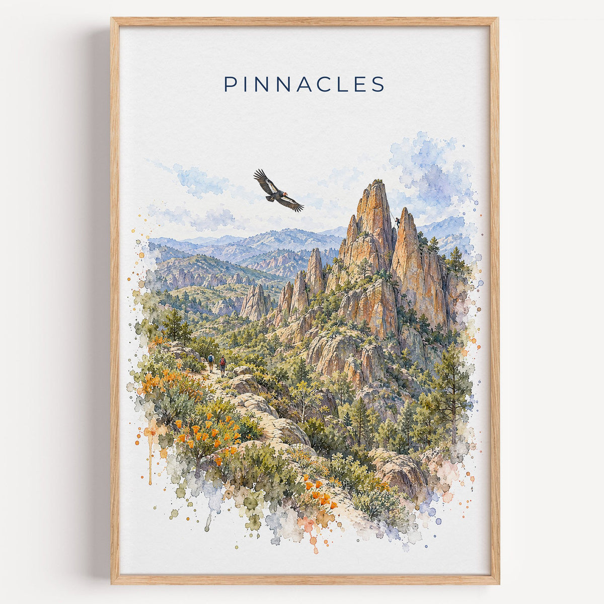 Pinnacles National Park watercolor print in a light oak frame on a plain white wall
