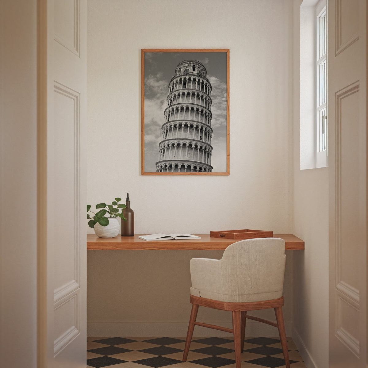 Leaning Tower of Pisa arcades from below print in an oak frame above a home office desk nook