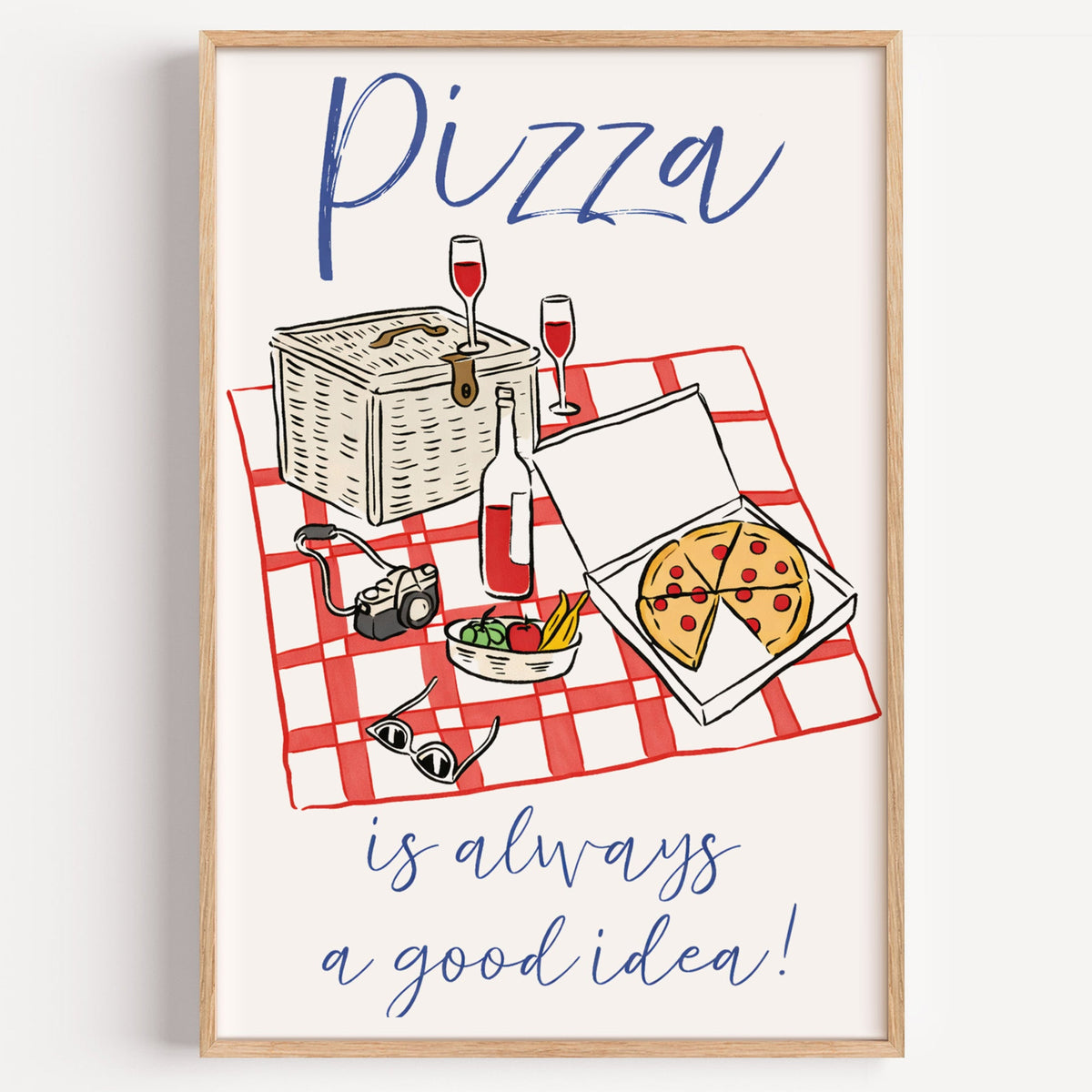 Pizza picnic print in a light oak frame on a plain white wall