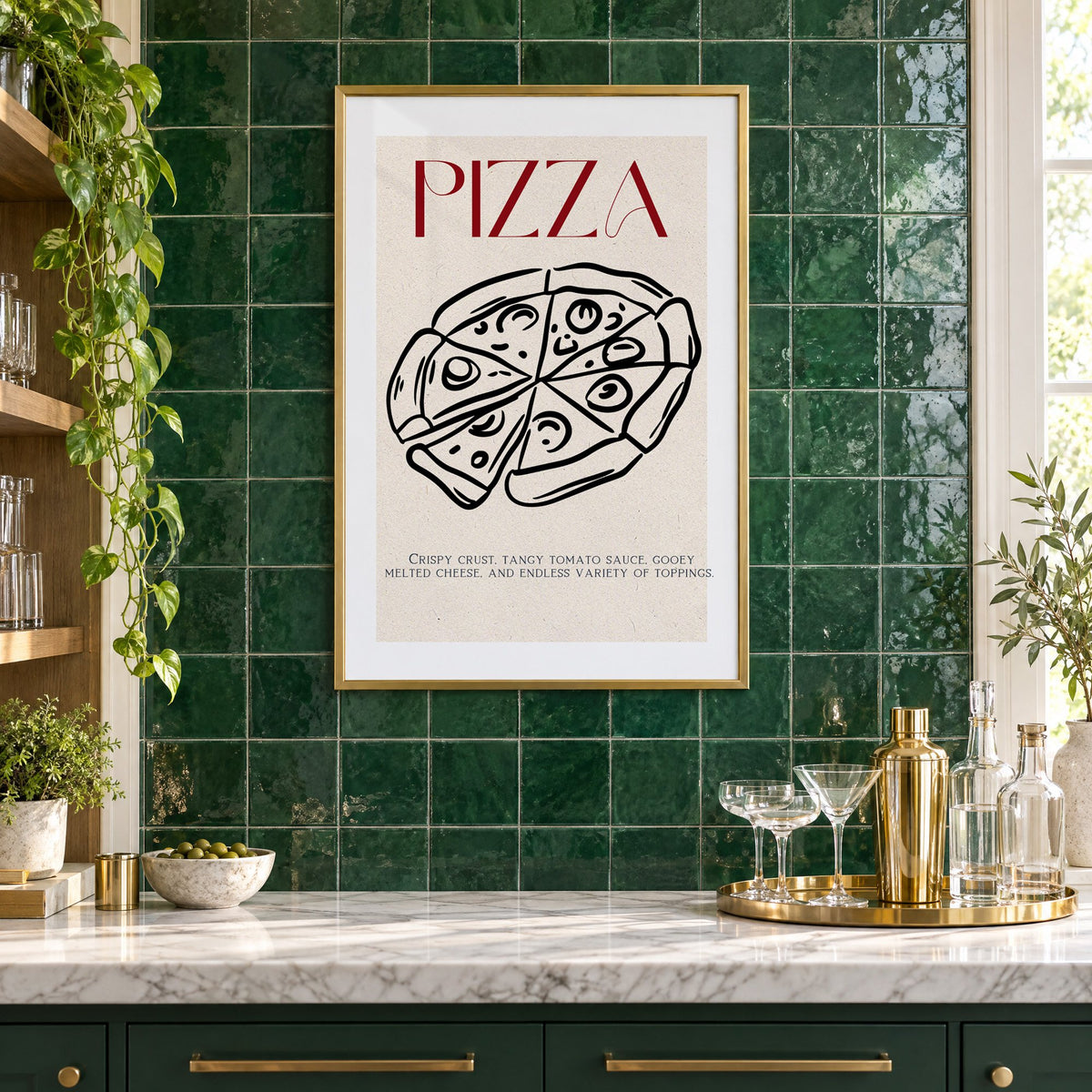 PIZZA red title line-art pizza print in a brass frame on emerald green tiles above a home bar with coupe glasses