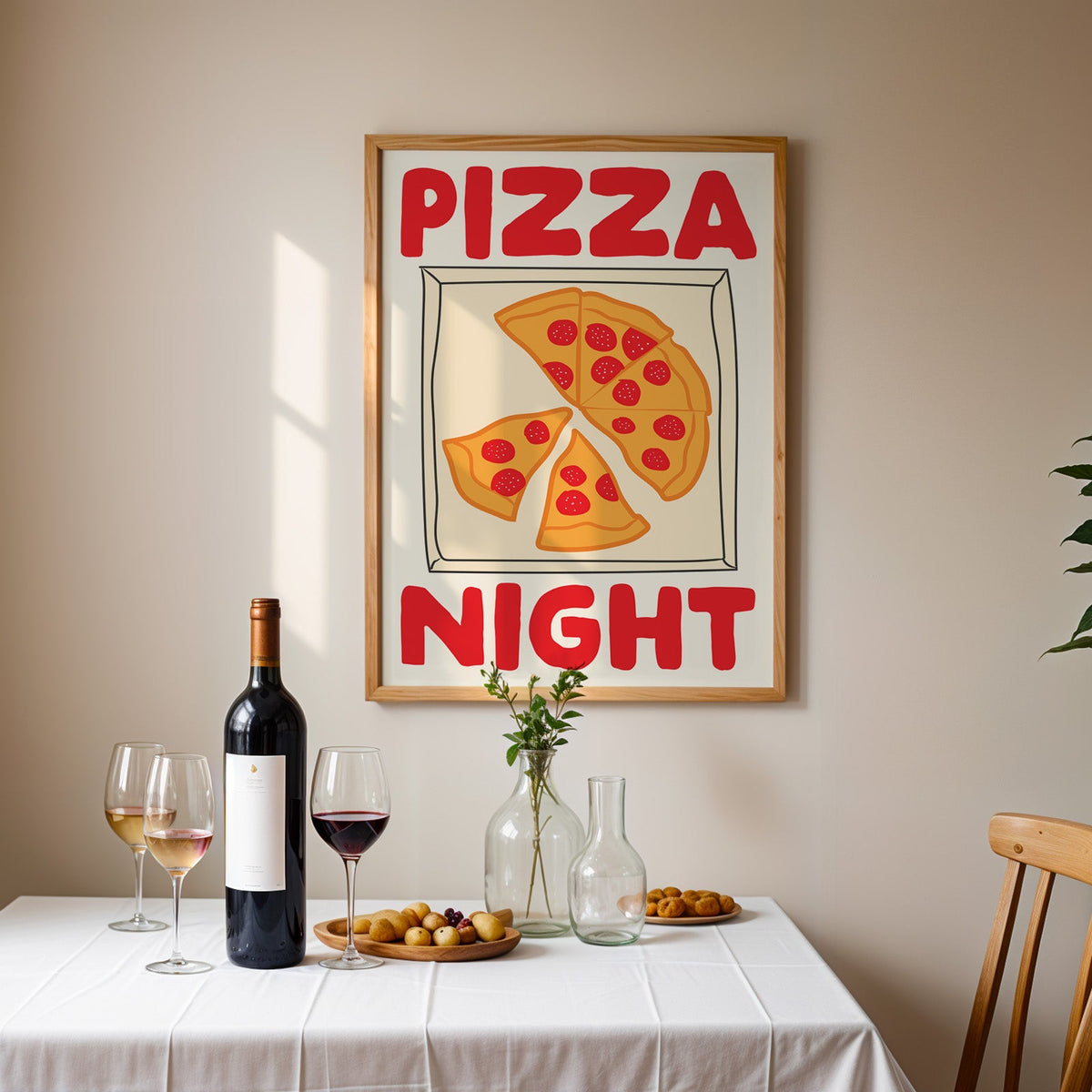 Pizza night pepperoni box print in an oak frame above a table laid with red wine