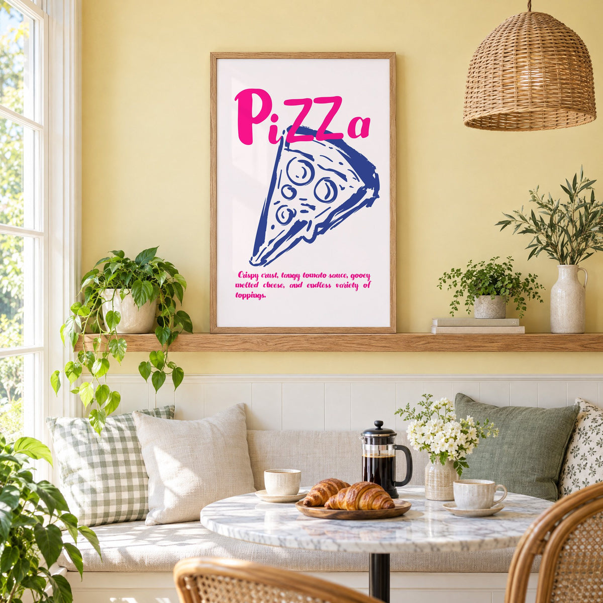 PiZZa pink script pizza slice print in an oak frame on a picture ledge above a sunny breakfast nook