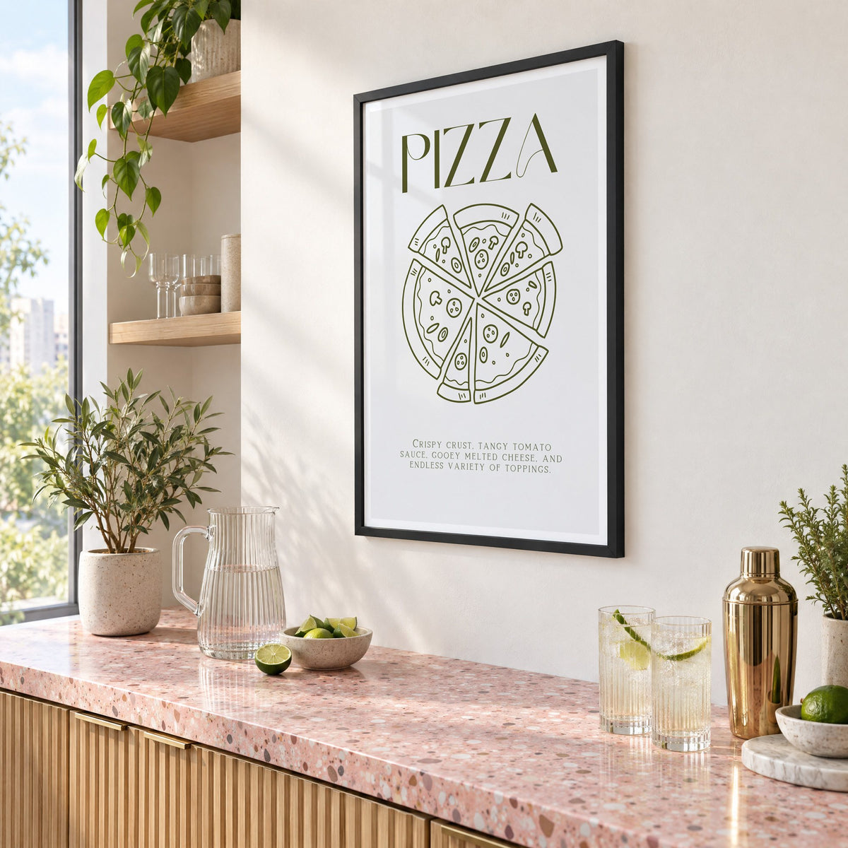 PIZZA olive line art print in a black frame above a pink terrazzo cocktail counter with limes, seen at an angle