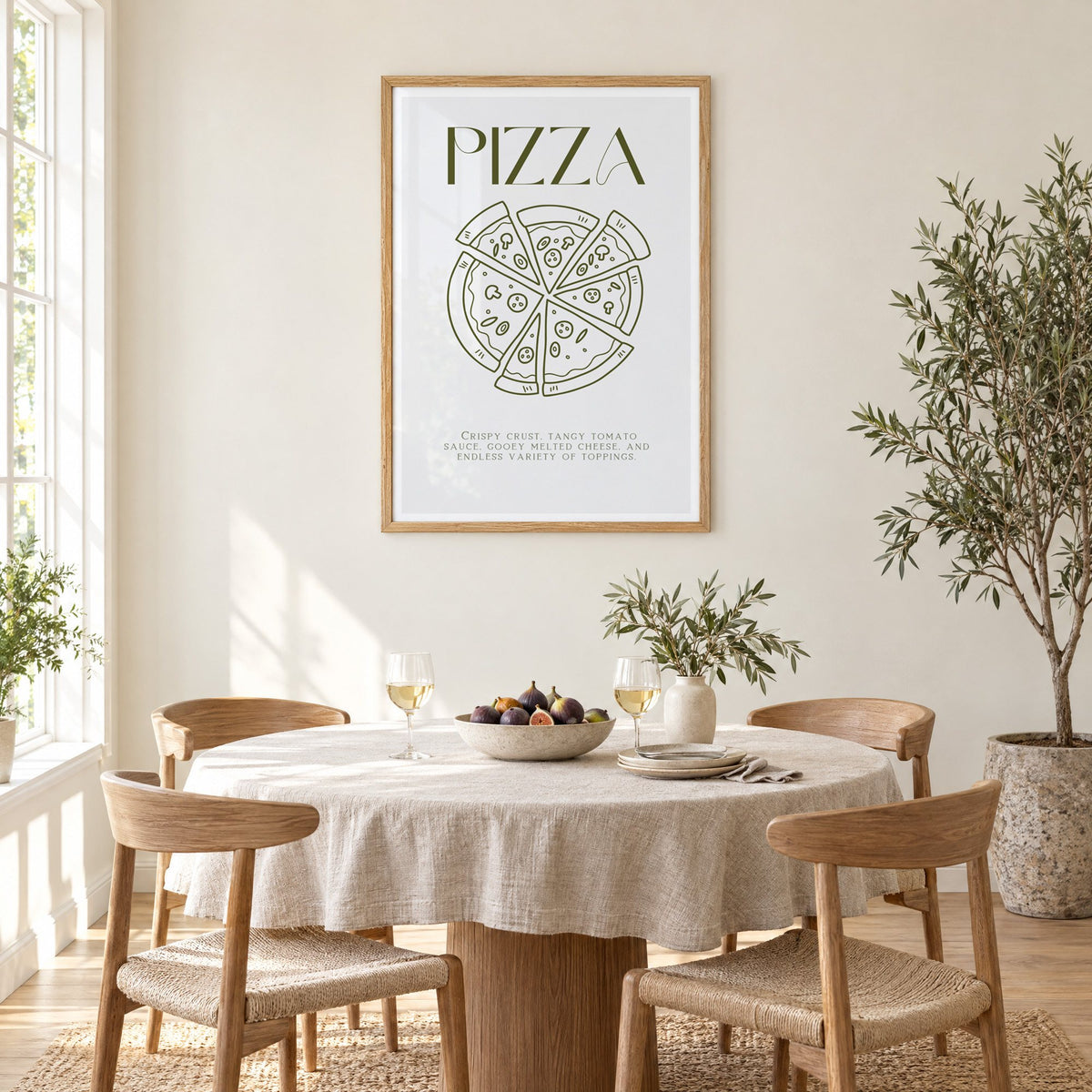PIZZA olive line art print in an oak frame above a round linen-covered dining table with figs and wine
