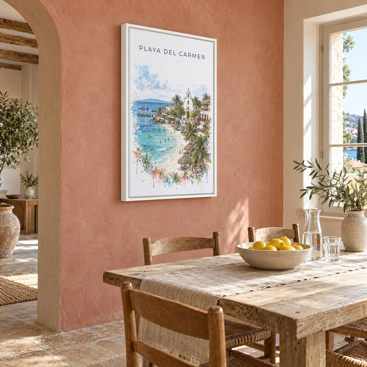 Playa del Carmen watercolor print as a white floater canvas on a terracotta wall above a rustic dining table