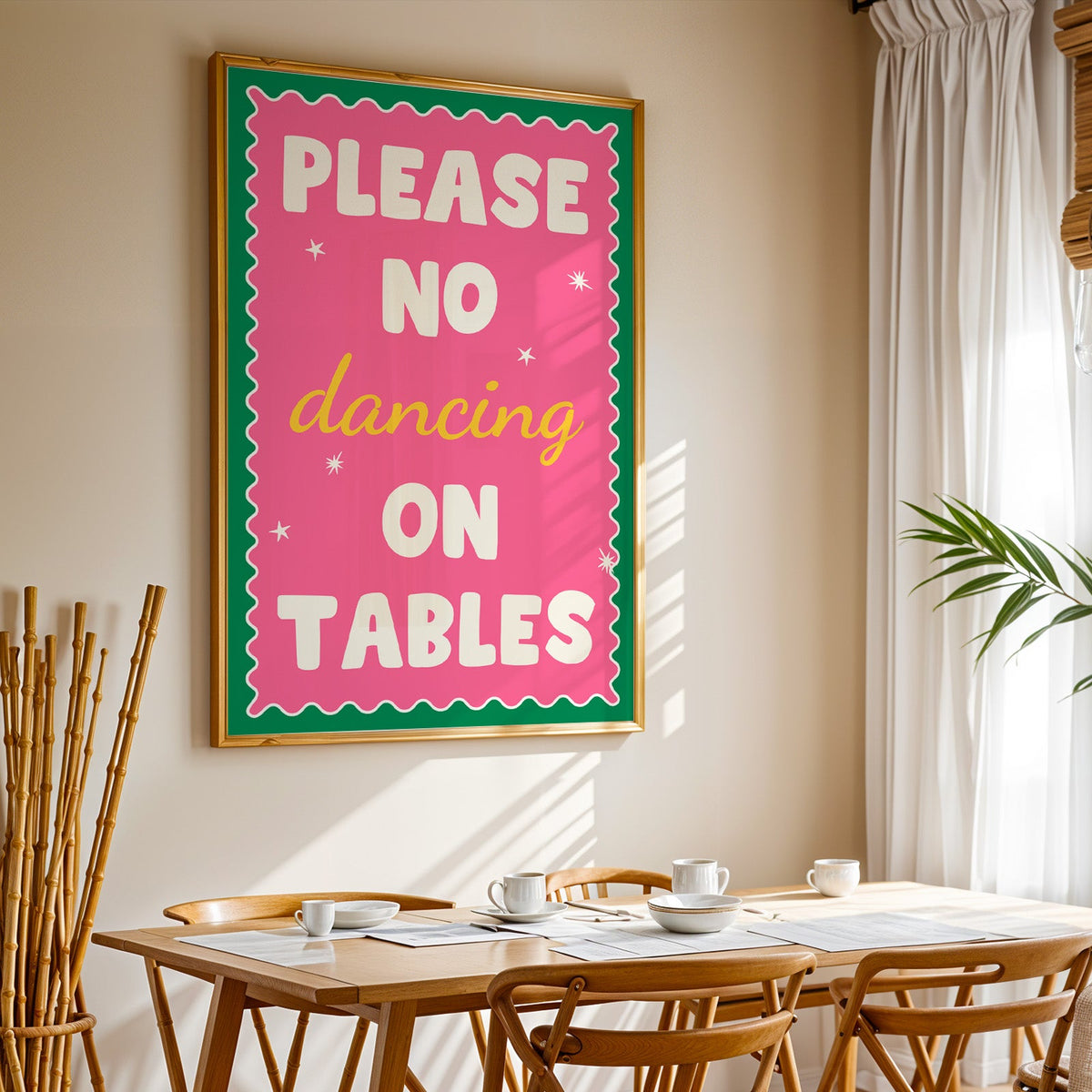 Please no dancing on tables print in a gold frame above a sunlit breakfast table