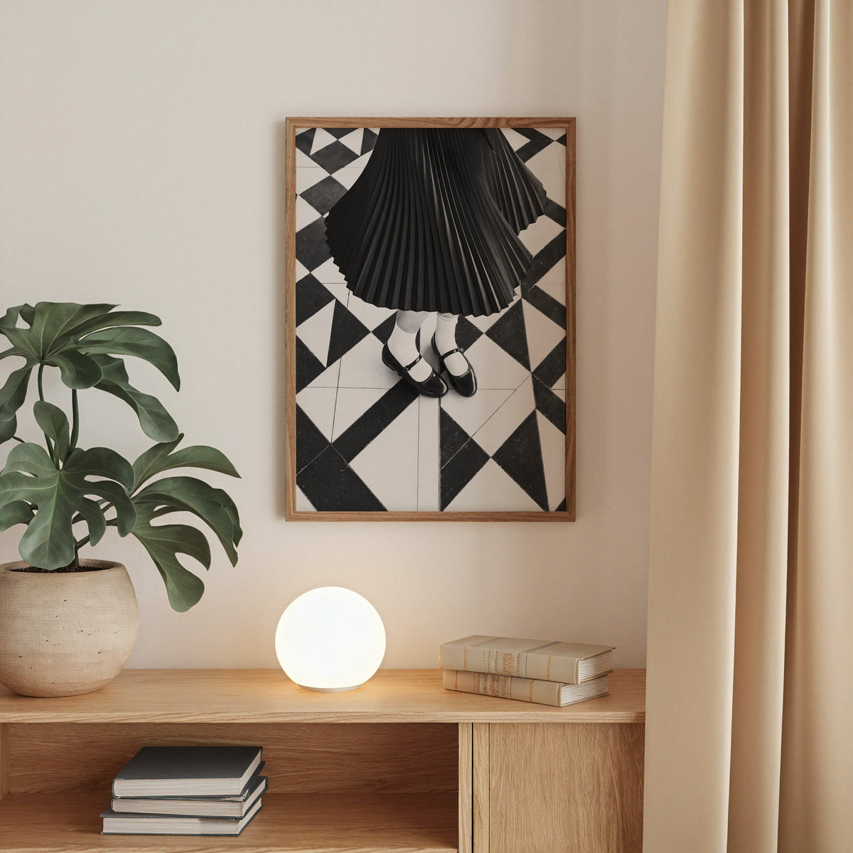 Pleated skirt and strap shoes on geometric tile print in a walnut frame above an oak cabinet with a glowing globe lamp