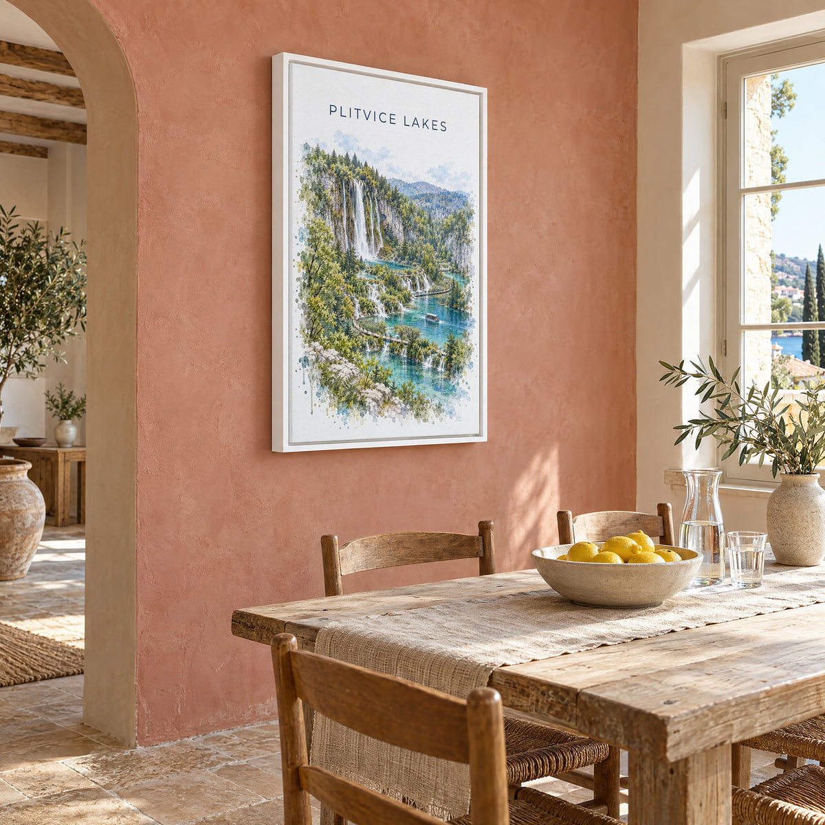 Plitvice Lakes watercolor print as a white floater canvas on a terracotta wall above a rustic dining table