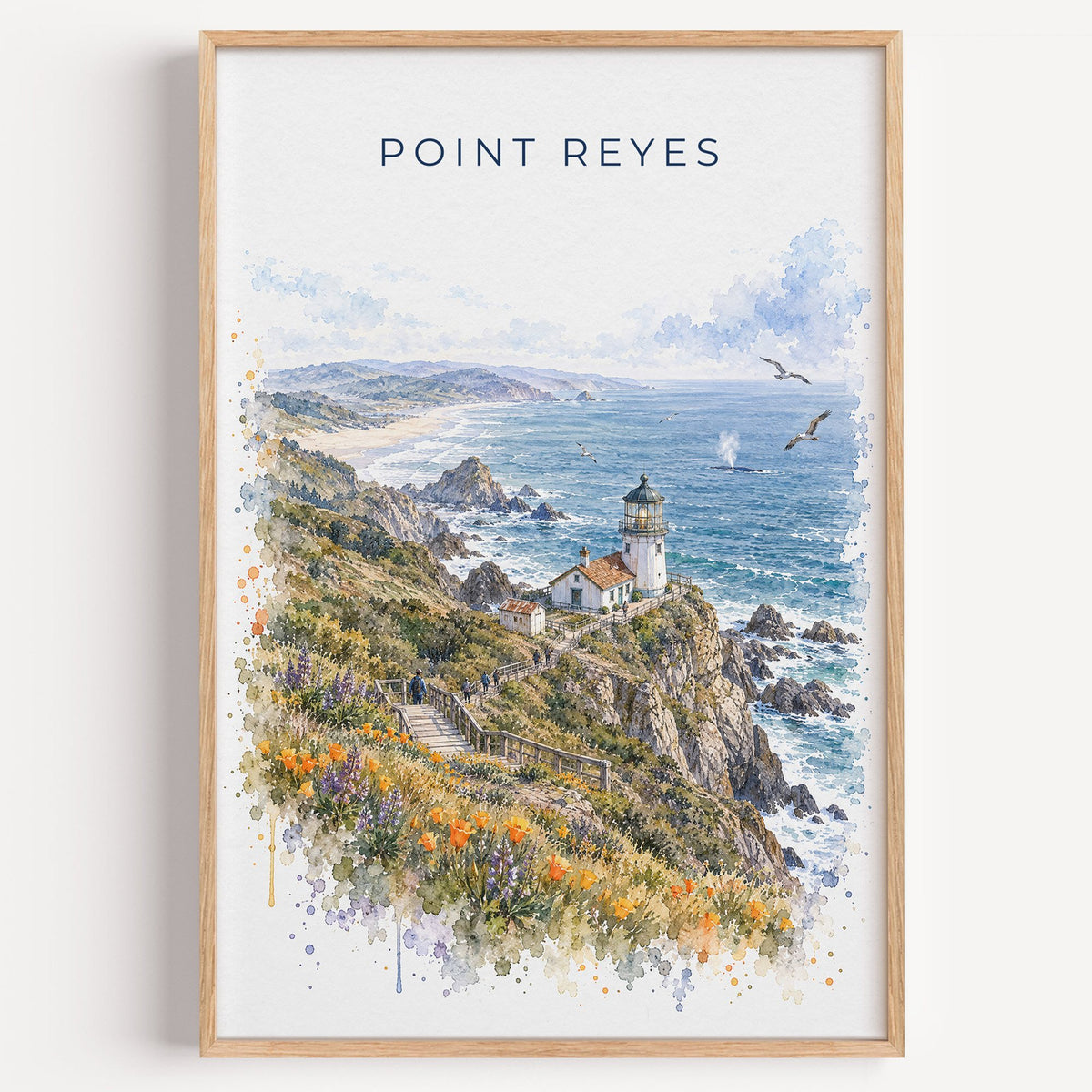Point Reyes watercolor print in a light oak frame on a plain white wall