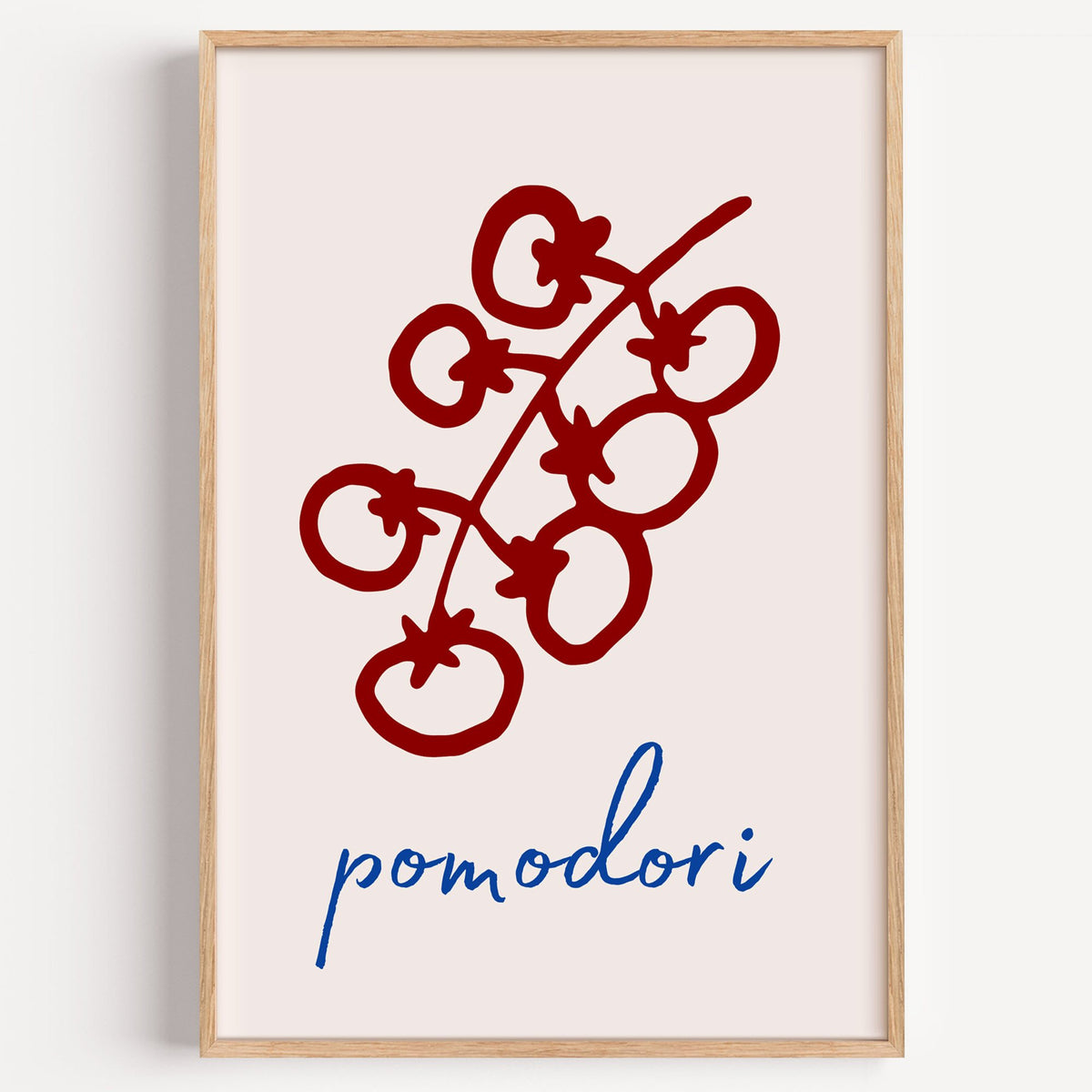 pomodori red cherry tomato vine print in a light oak frame on a plain white wall