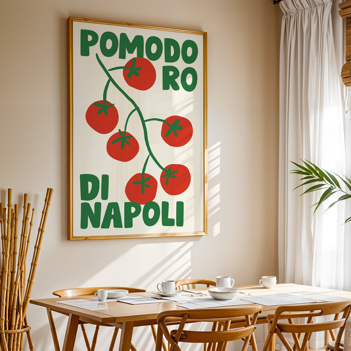 Pomodoro di Napoli tomato print in a gold frame above a sunlit breakfast table
